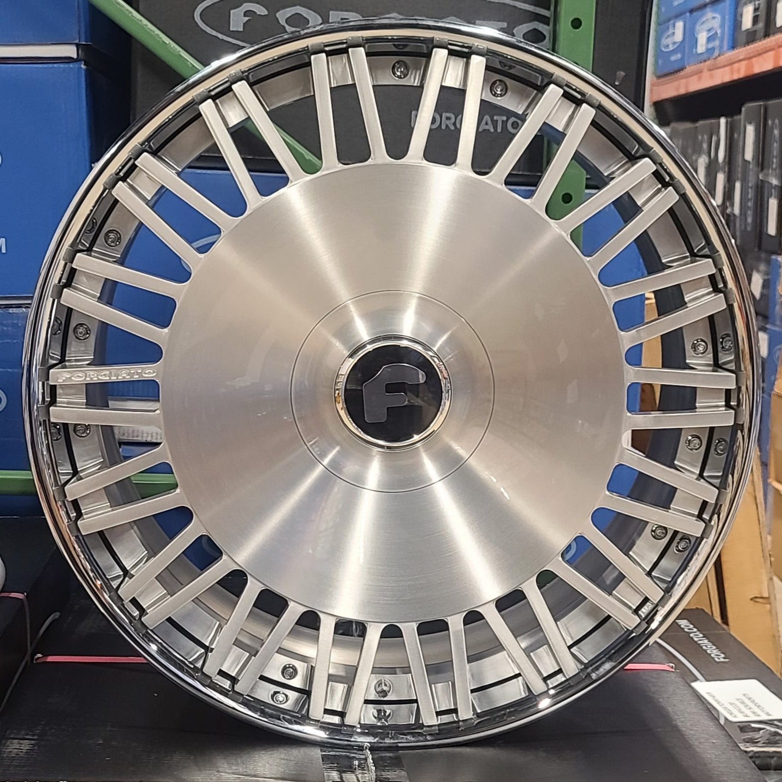 A single green leaf against a white background.
