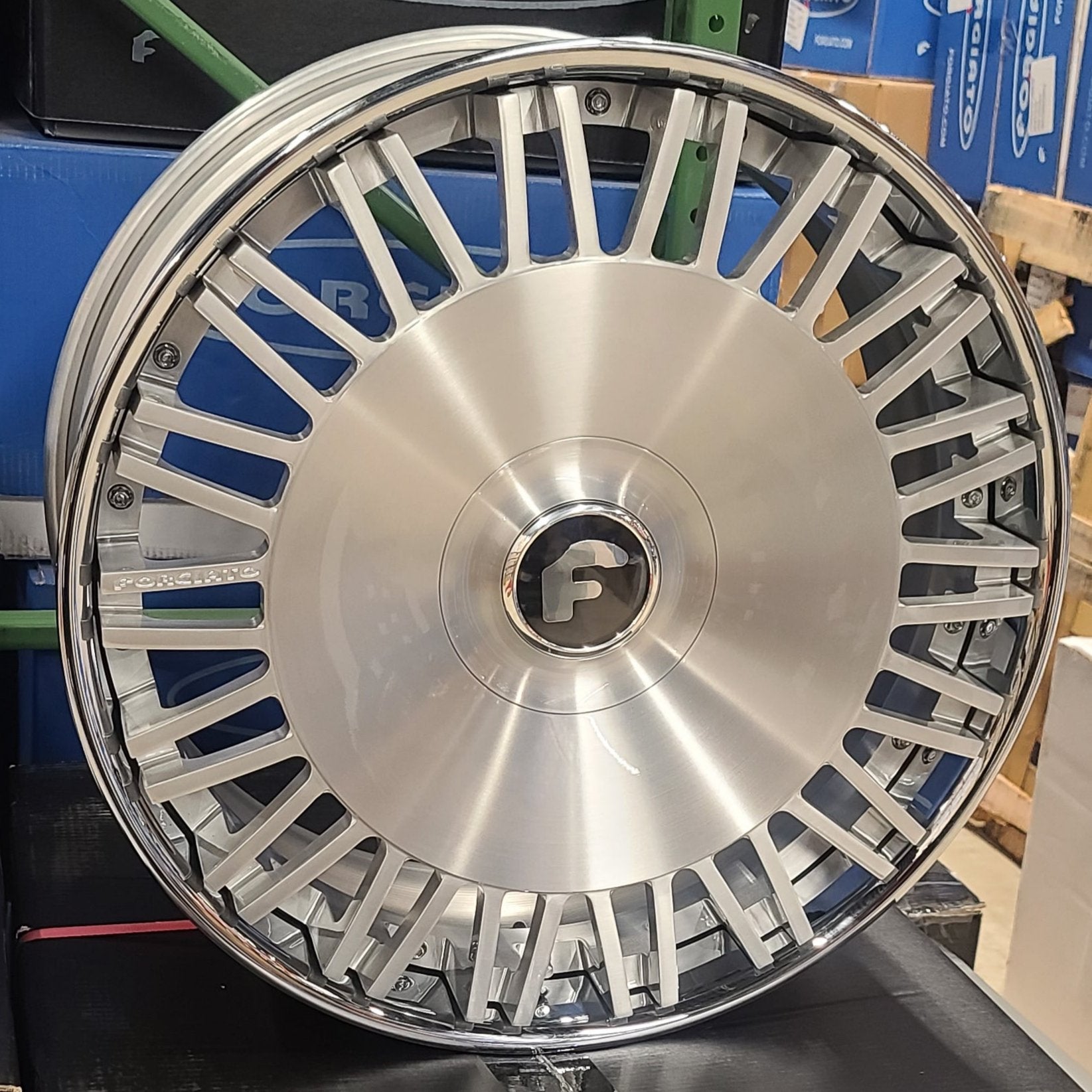 A single green leaf against a white background.