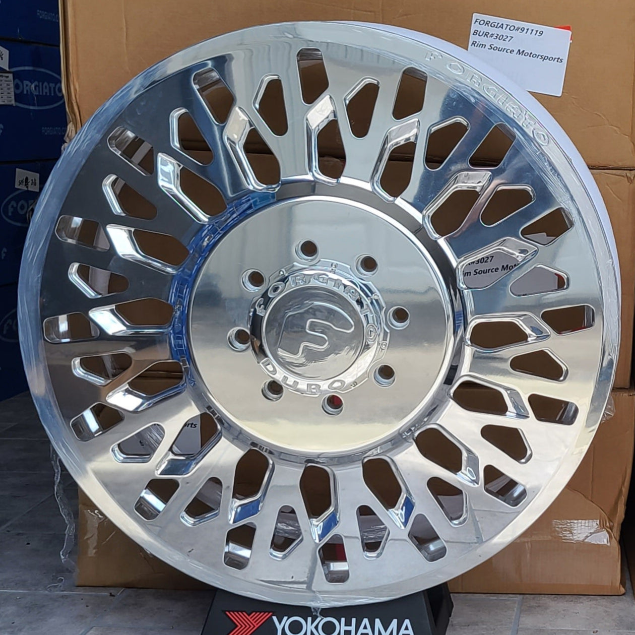A single green leaf against a white background.