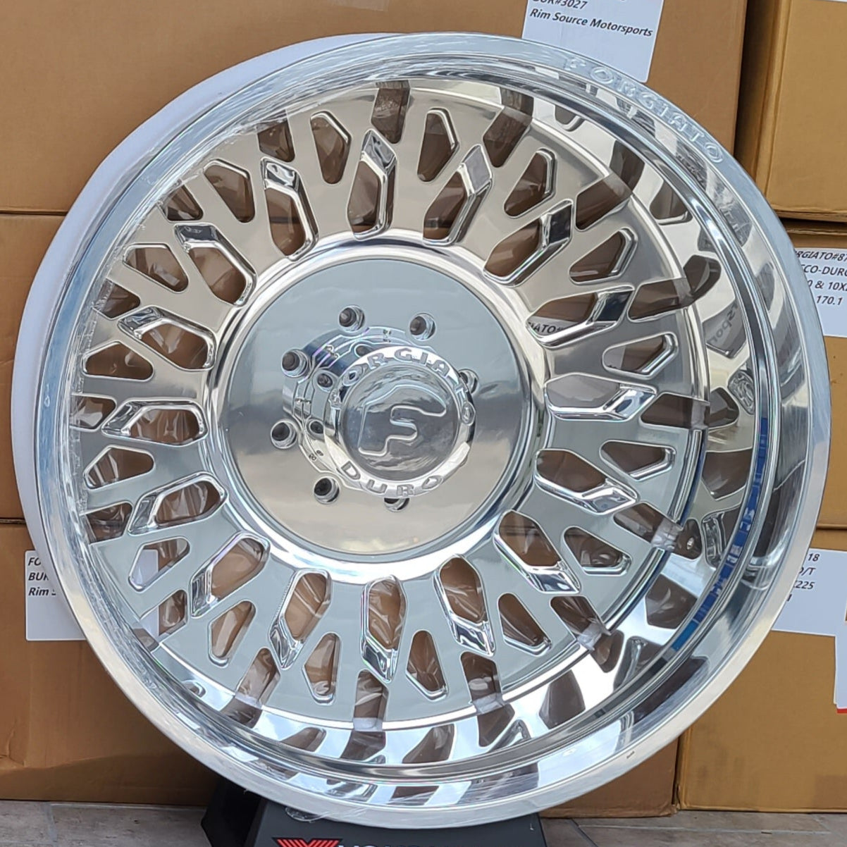 A single green leaf against a white background.