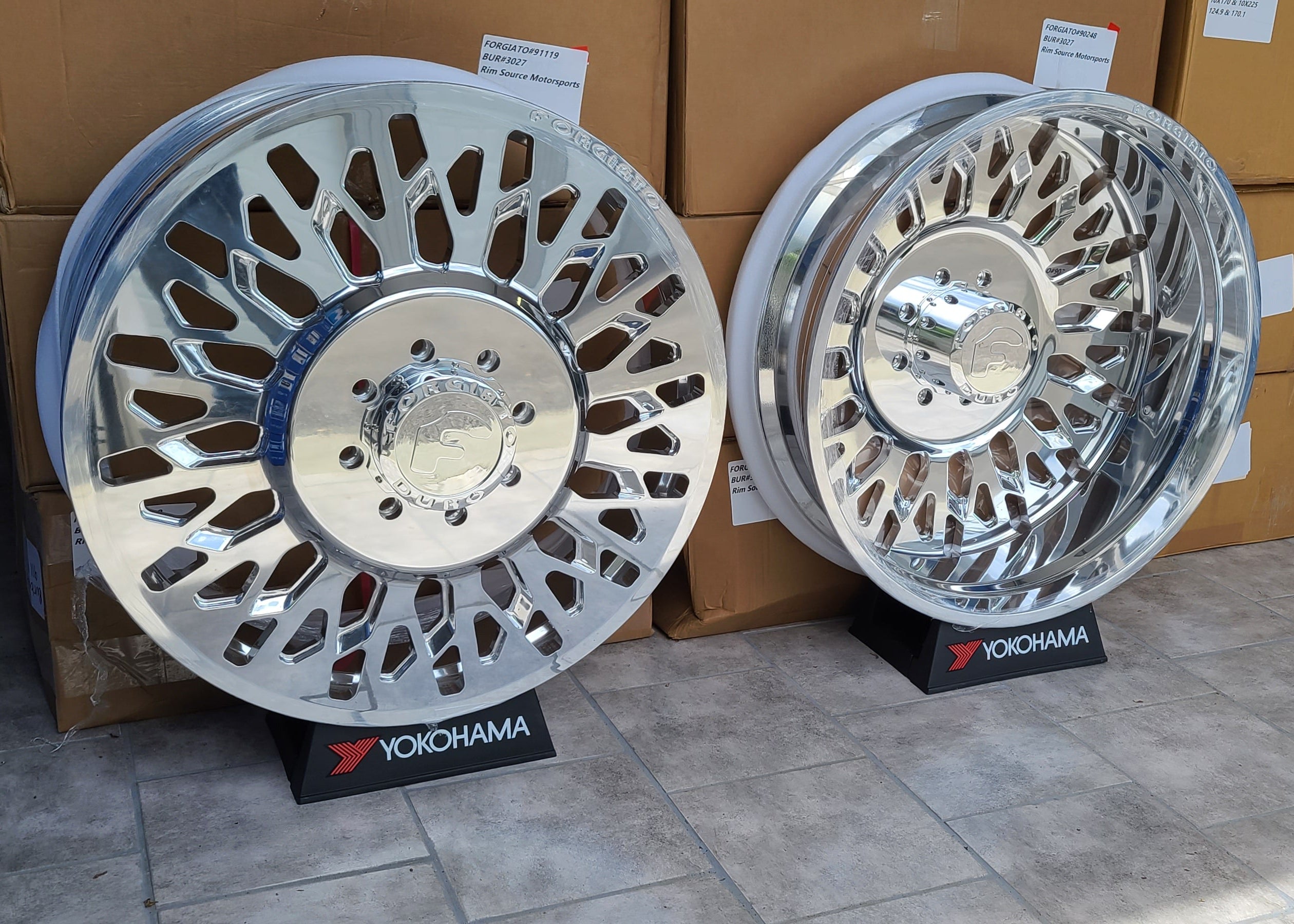 A single green leaf against a white background.