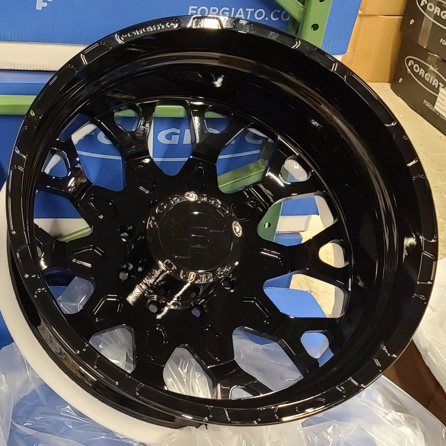 A single green leaf against a white background.