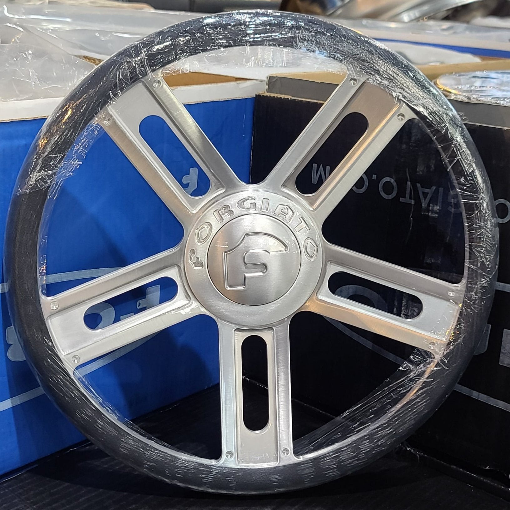 A single green leaf against a white background.