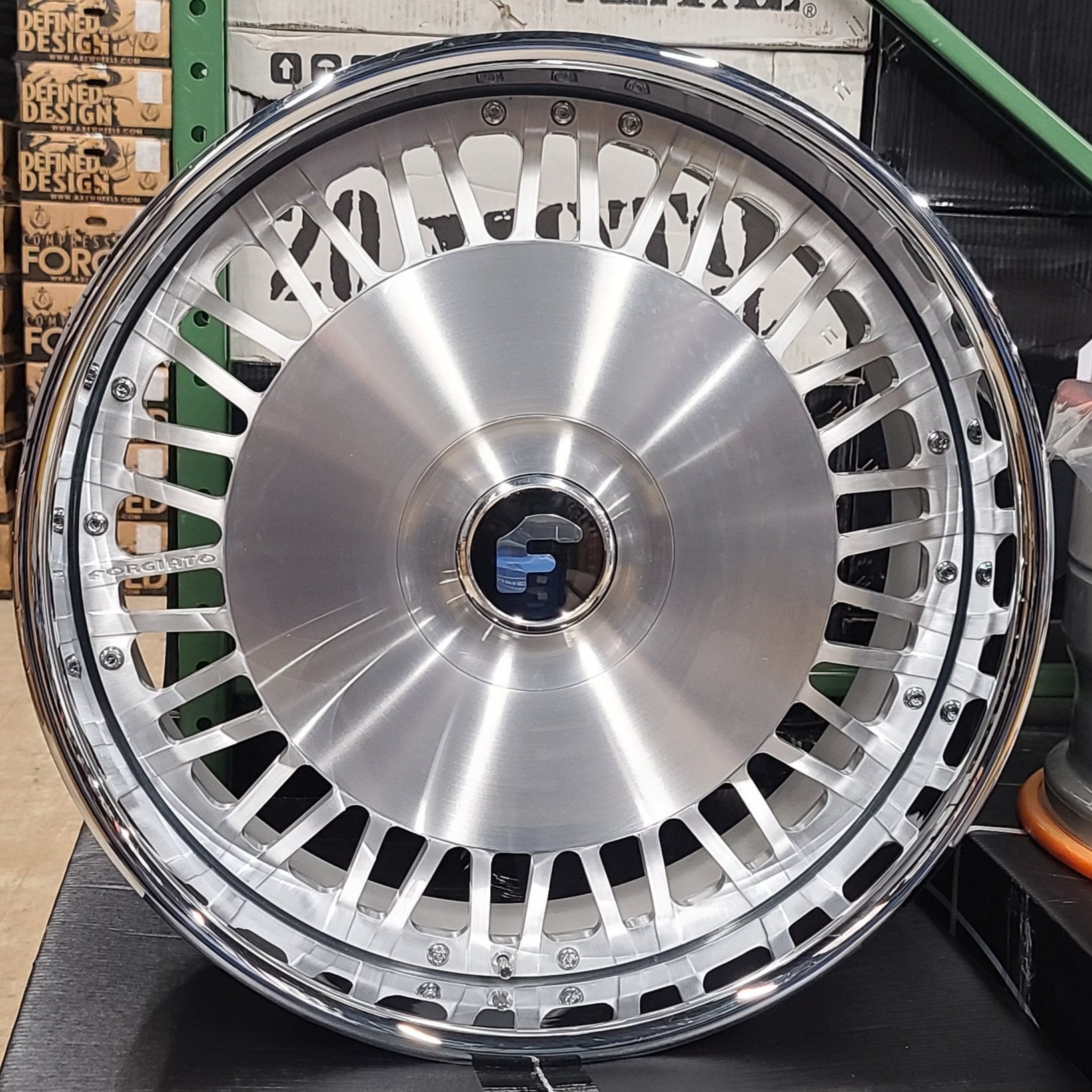 A single green leaf against a white background.