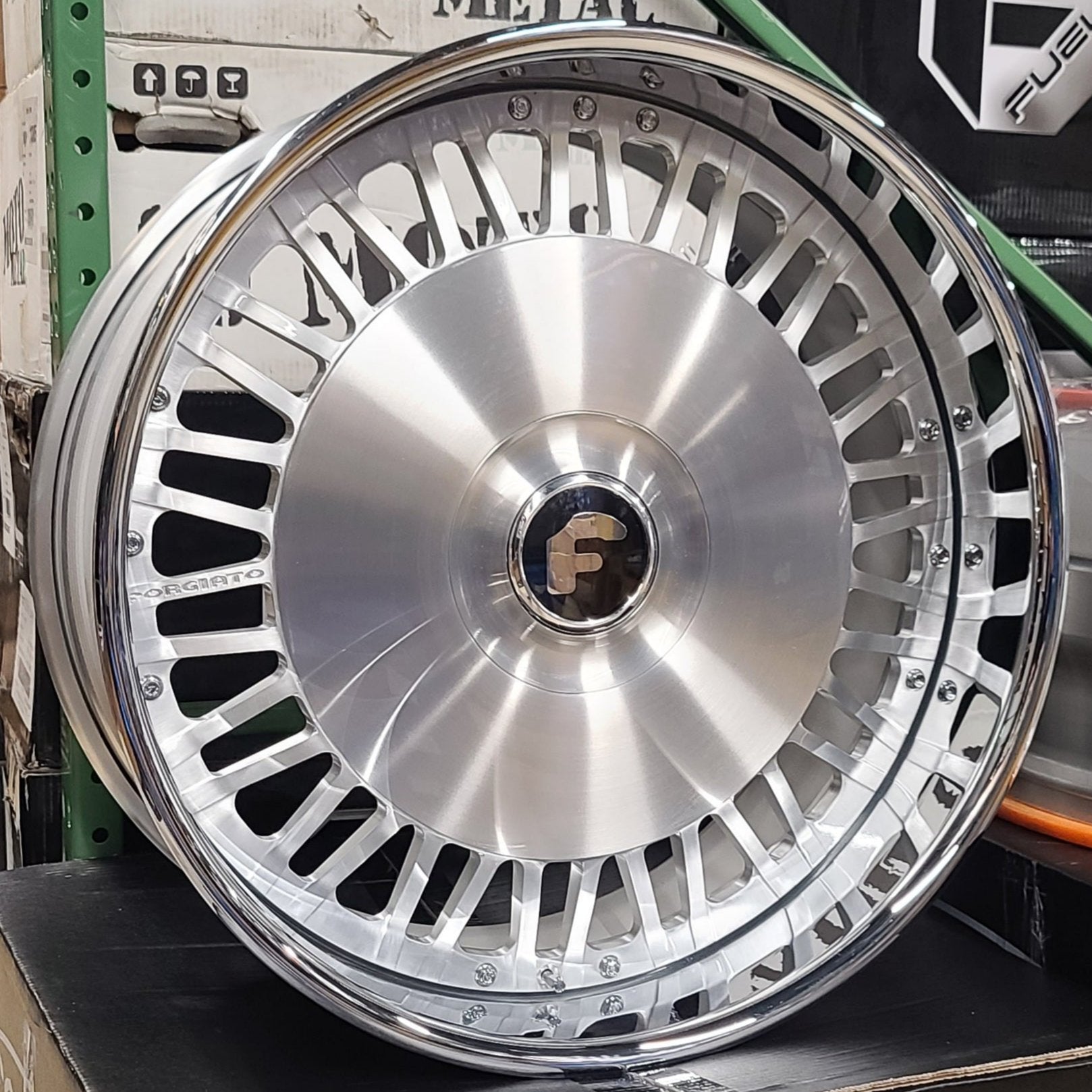 A single green leaf against a white background.
