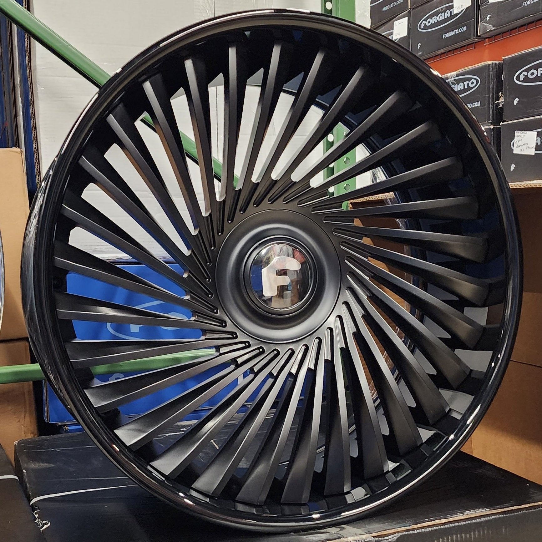 A single green leaf against a white background.