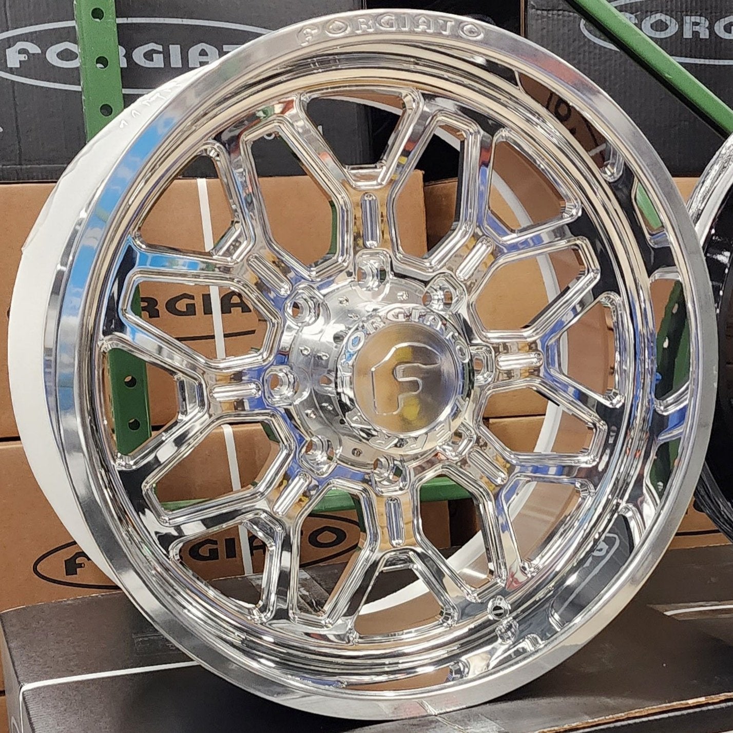 A single green leaf against a white background.