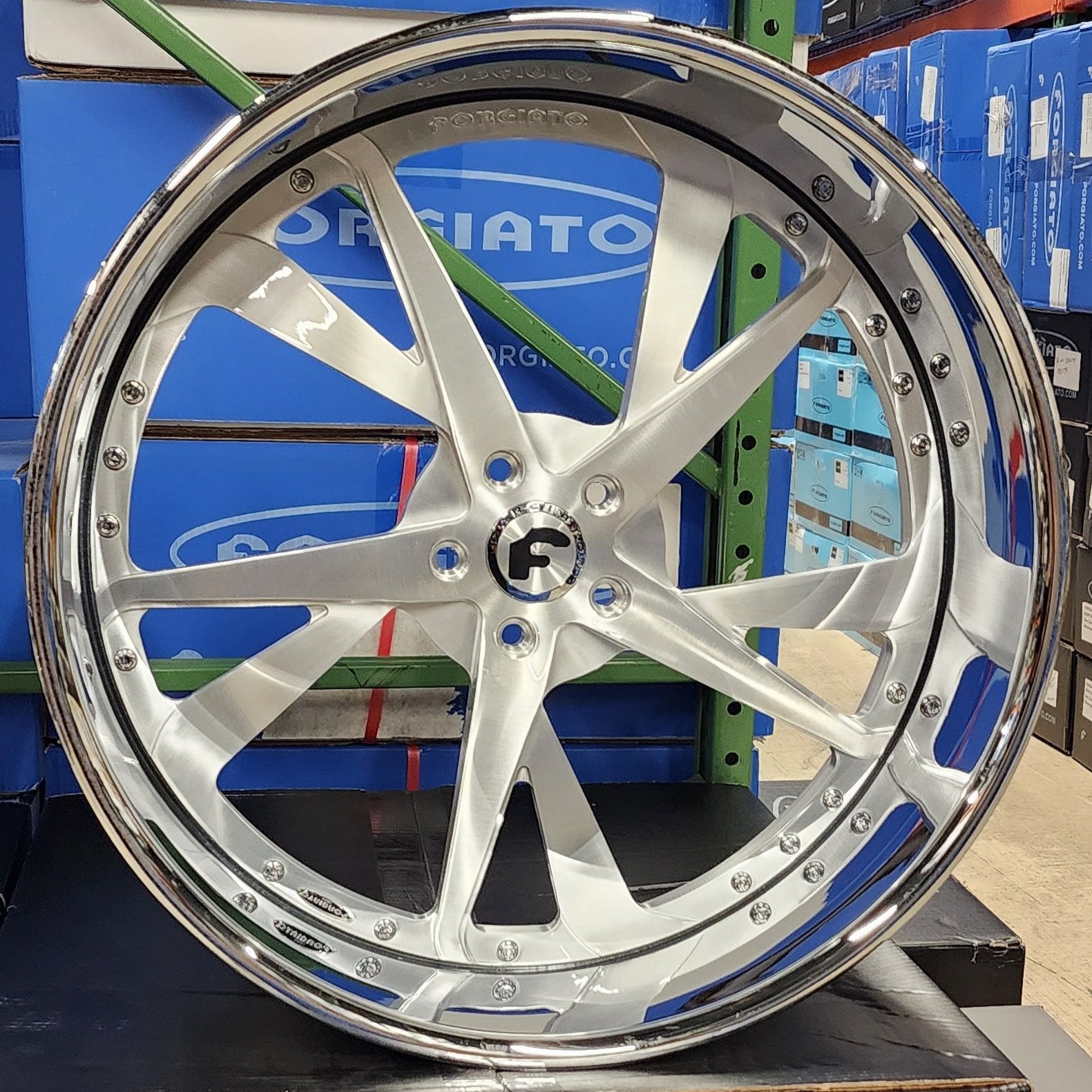 A single green leaf against a white background.