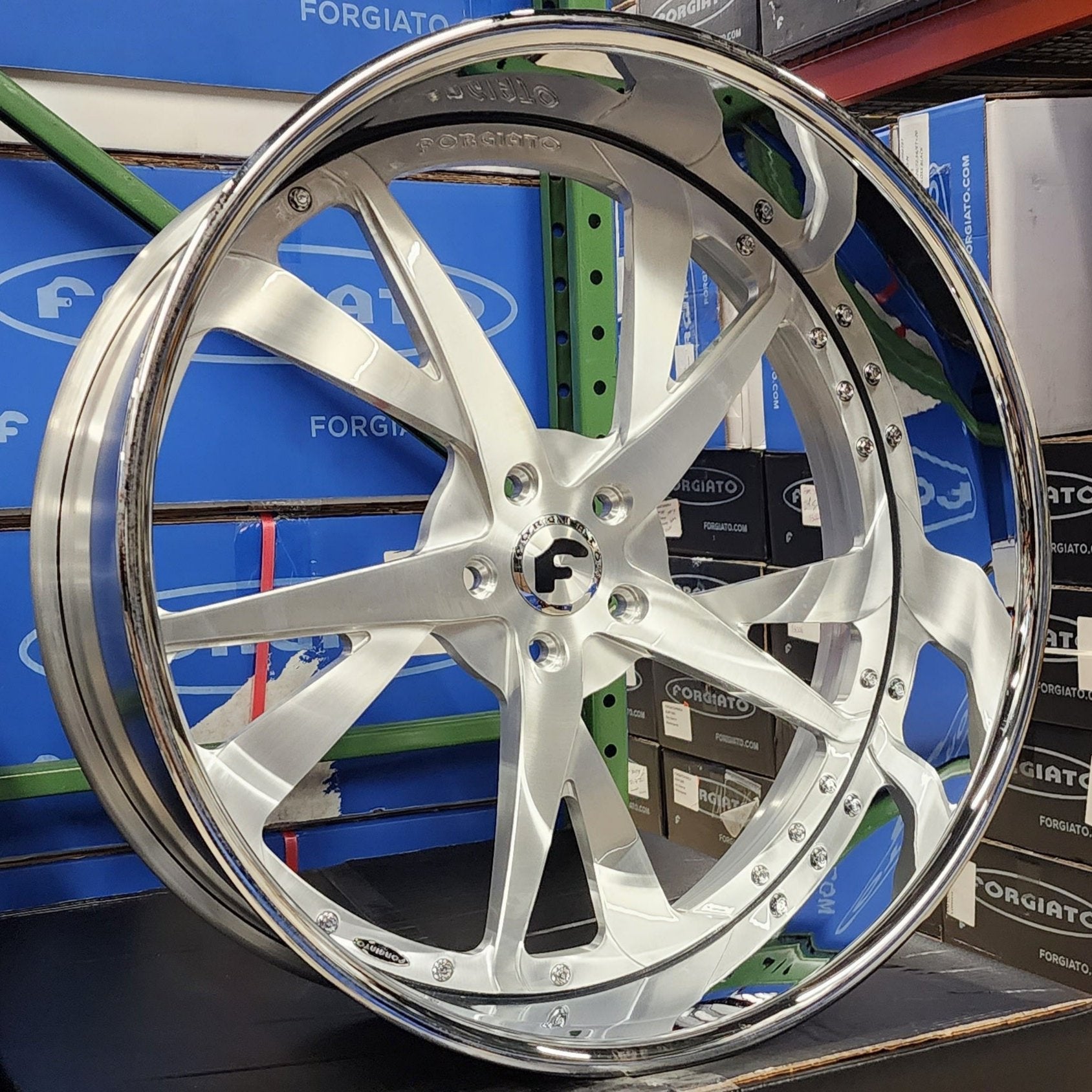 A single green leaf against a white background.