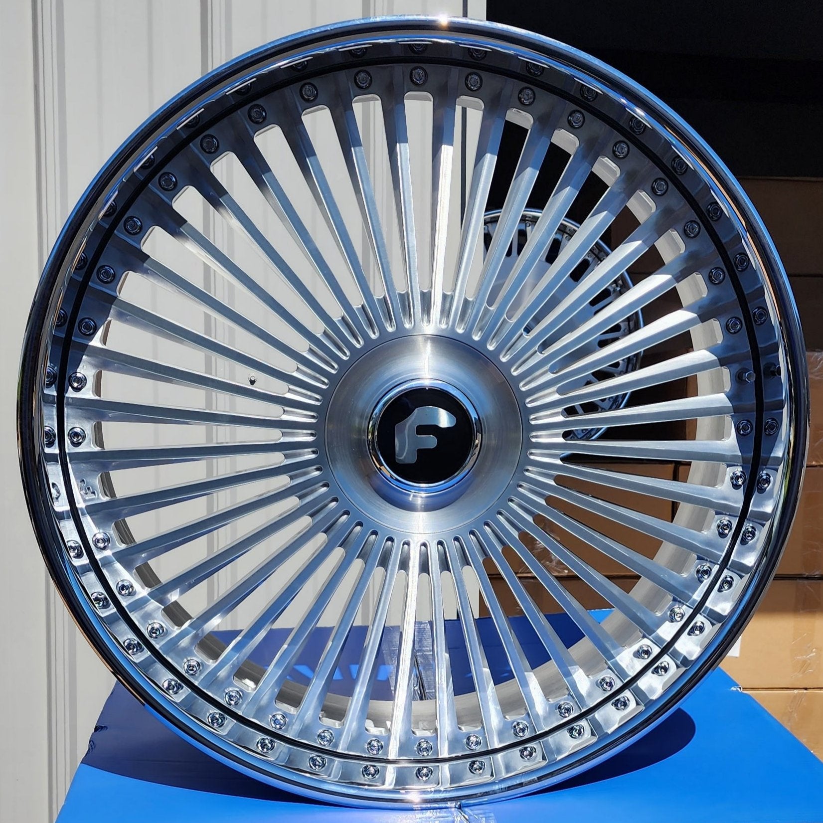 A single green leaf against a white background.