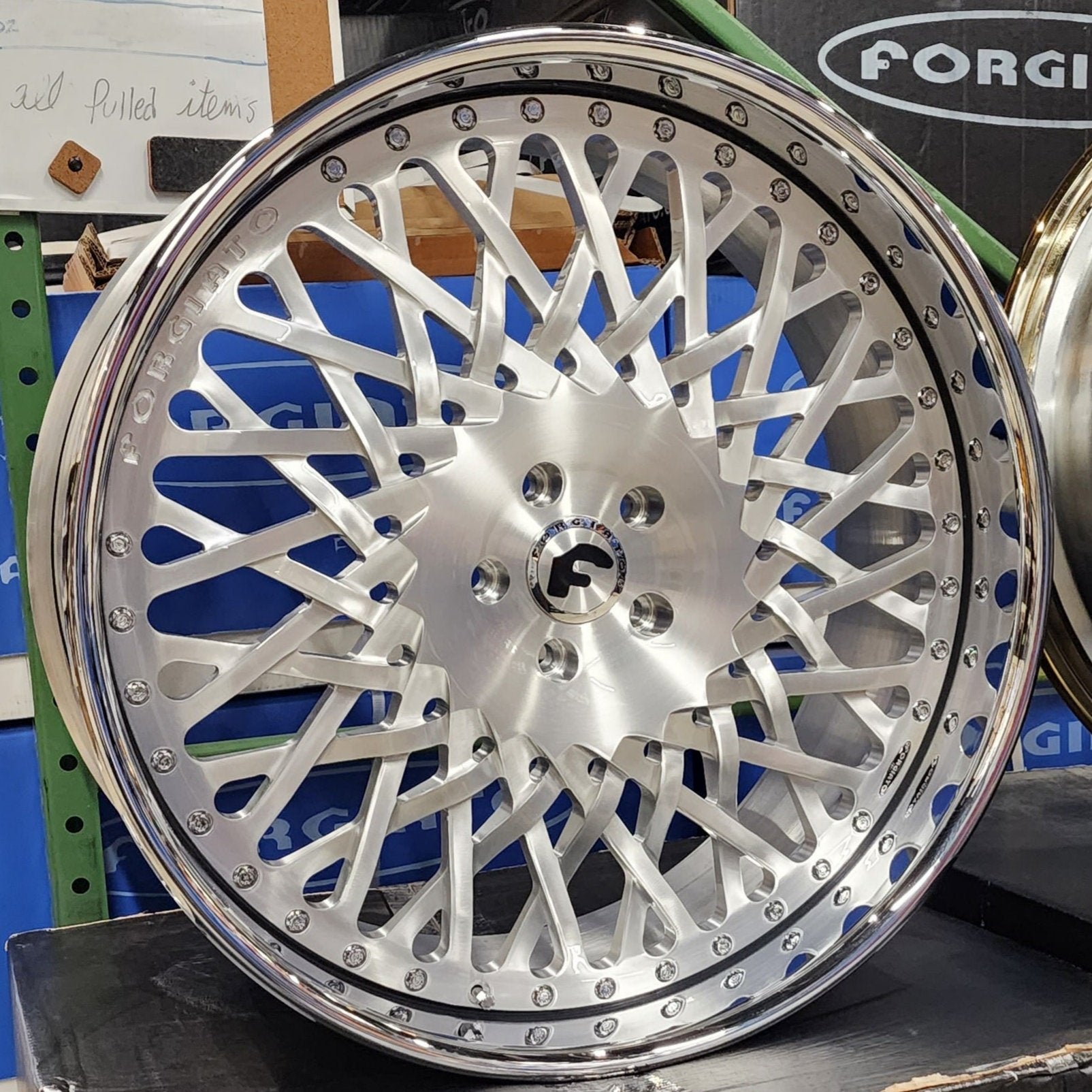 A single green leaf against a white background.