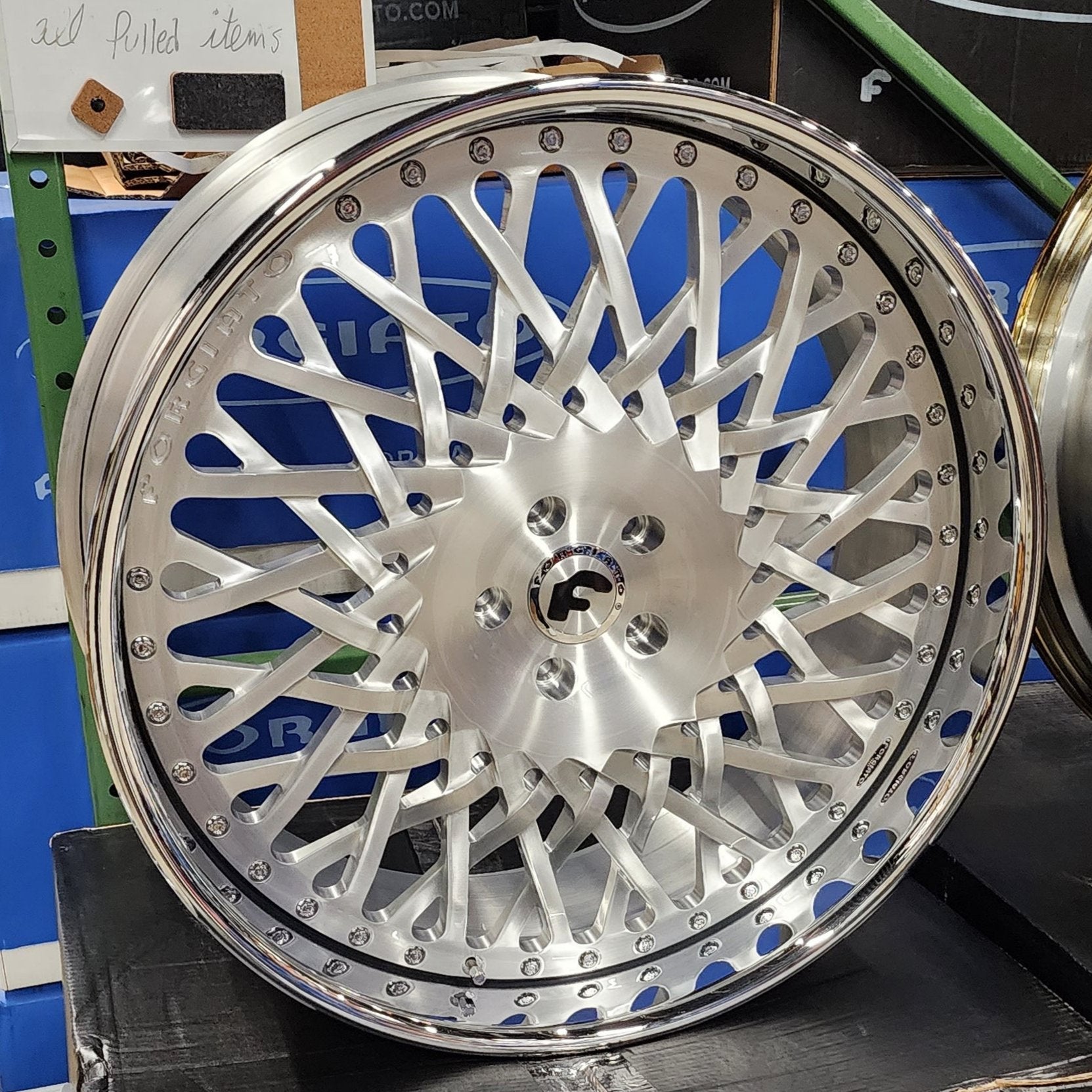 A single green leaf against a white background.