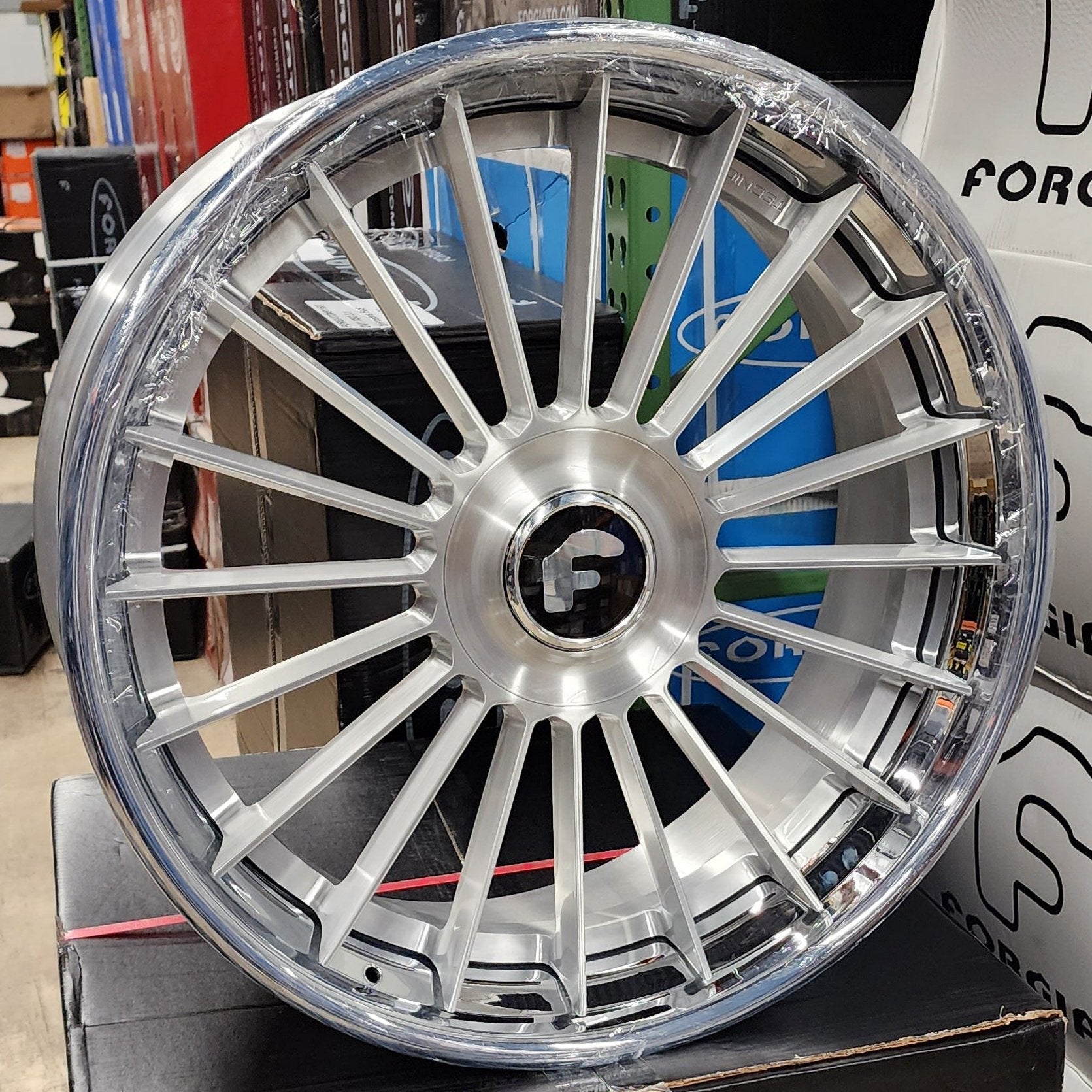 A single green leaf against a white background.