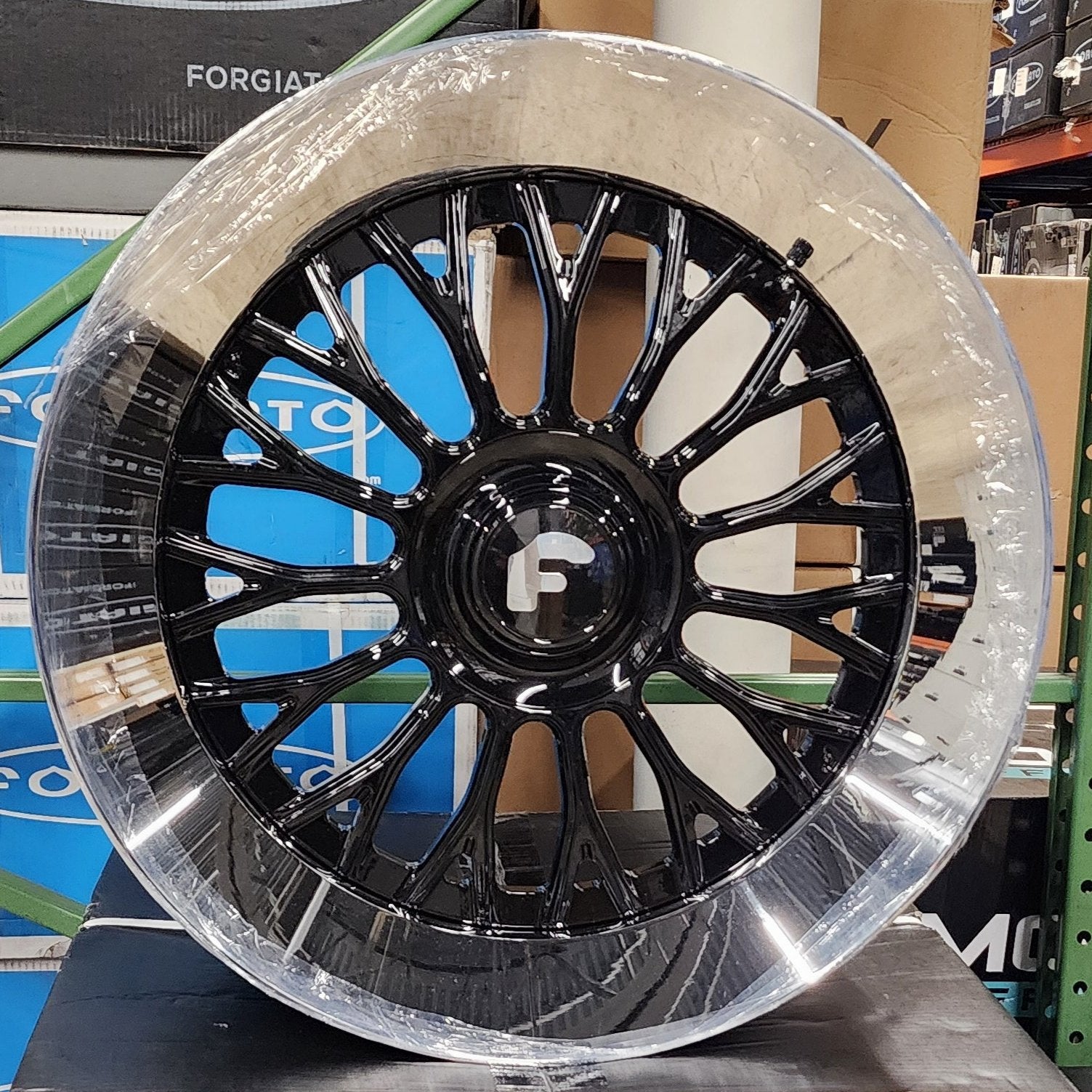 A single green leaf against a white background.