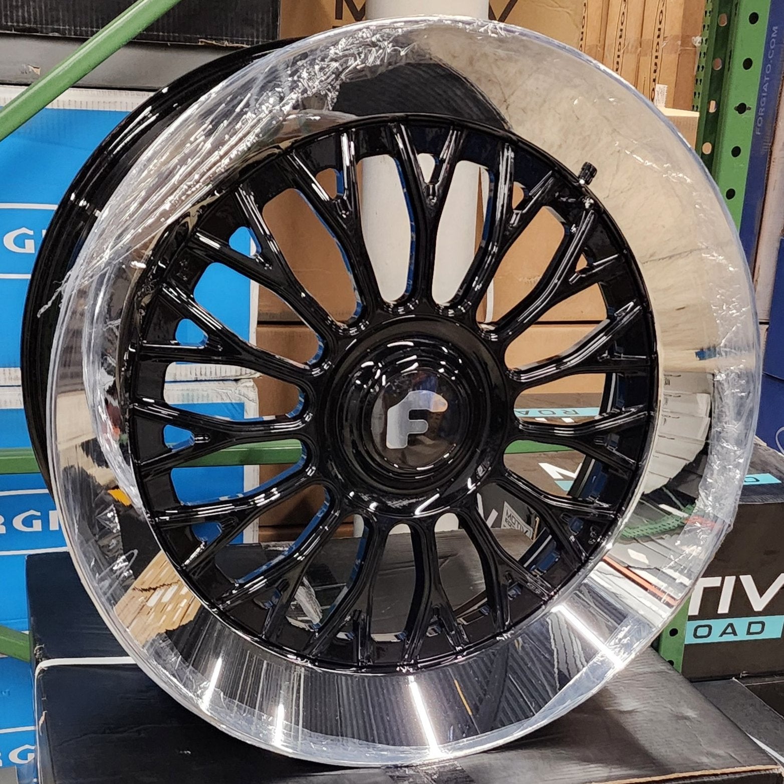 A single green leaf against a white background.