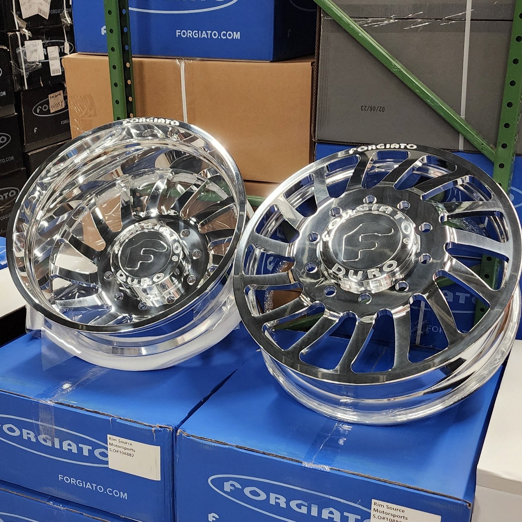 A single green leaf against a white background.