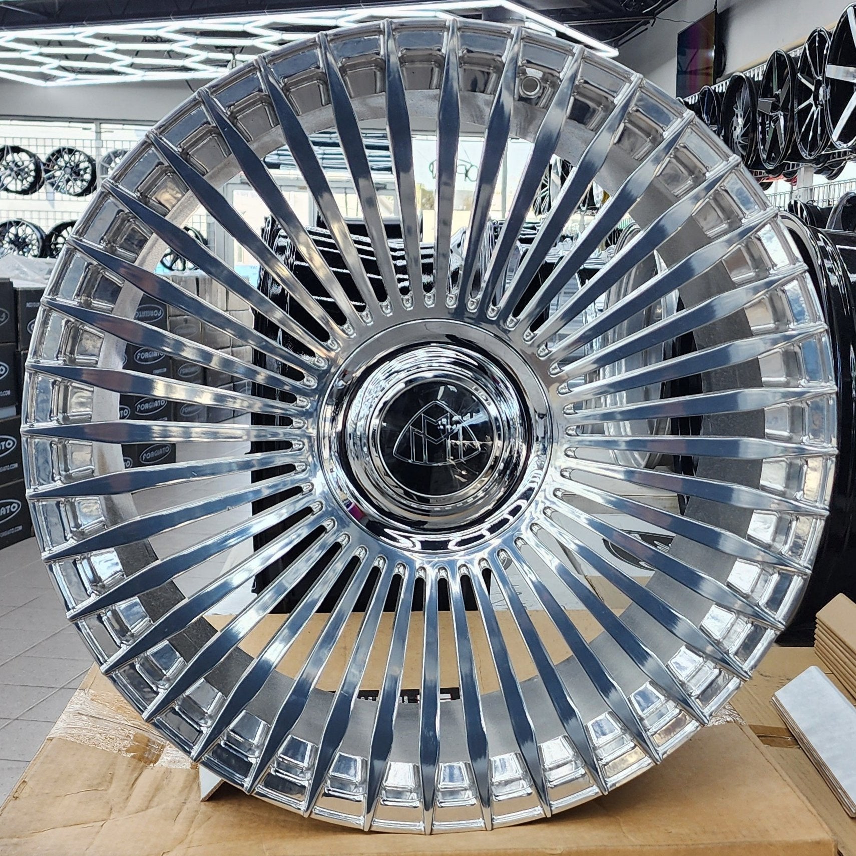 A single green leaf against a white background.