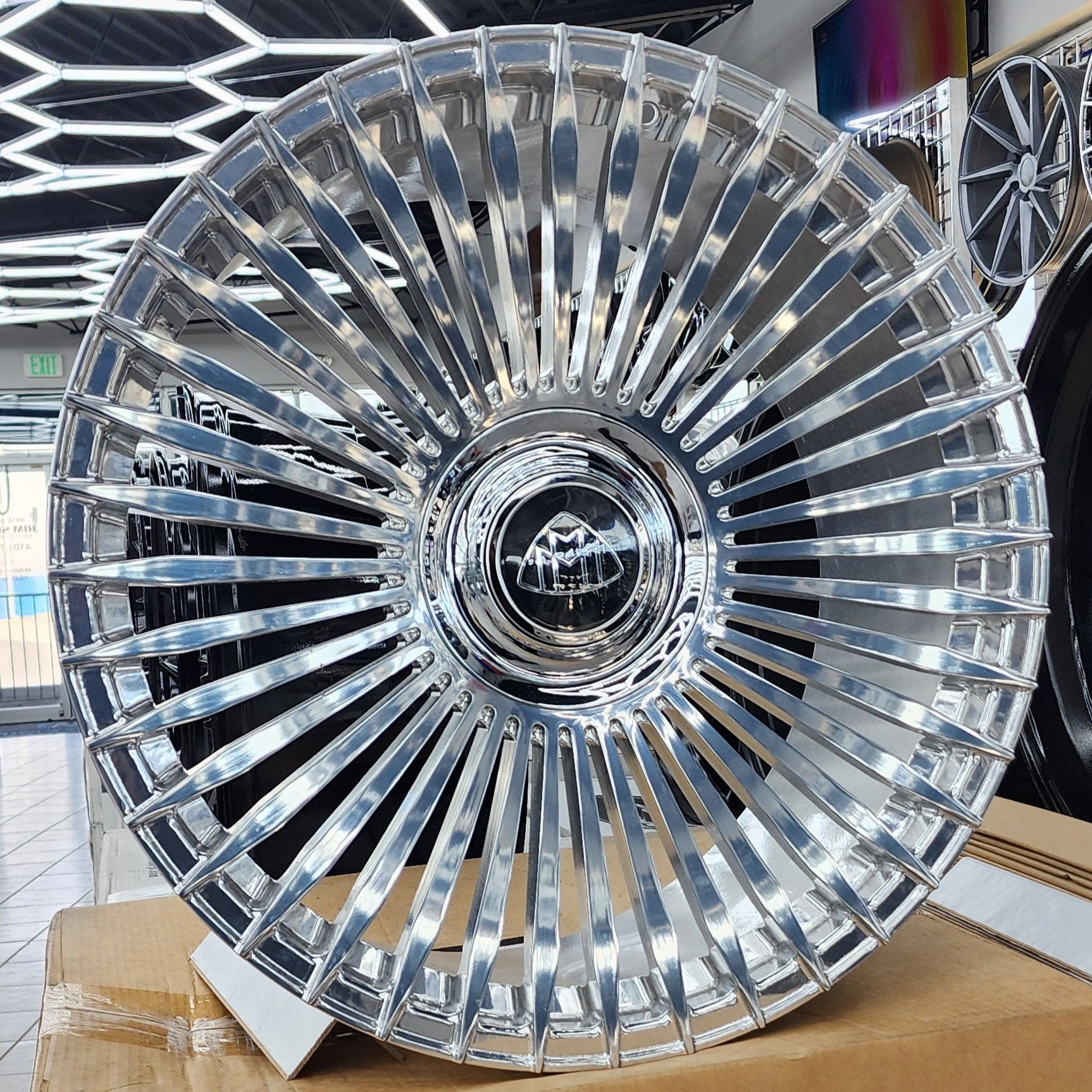 A single green leaf against a white background.