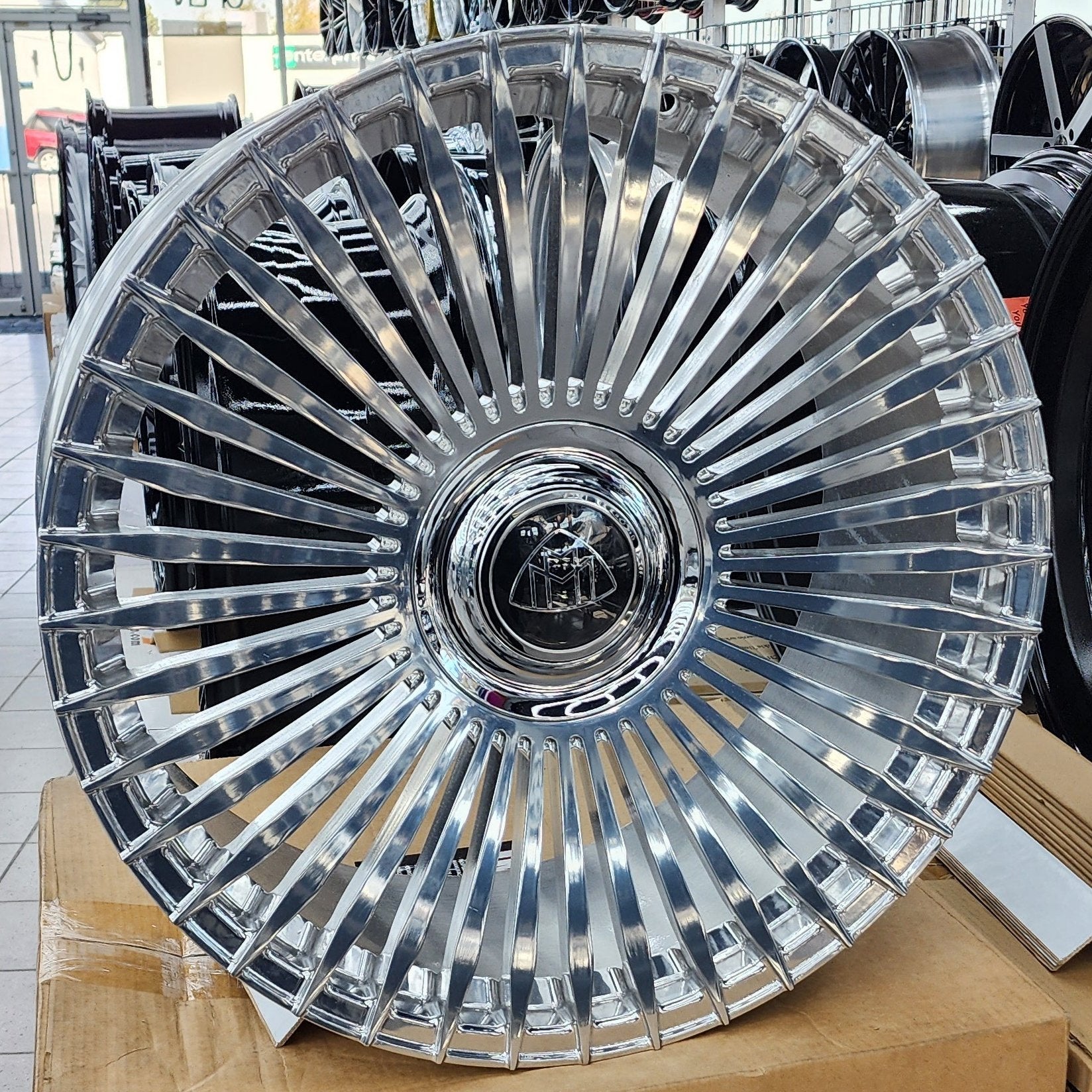 A single green leaf against a white background.