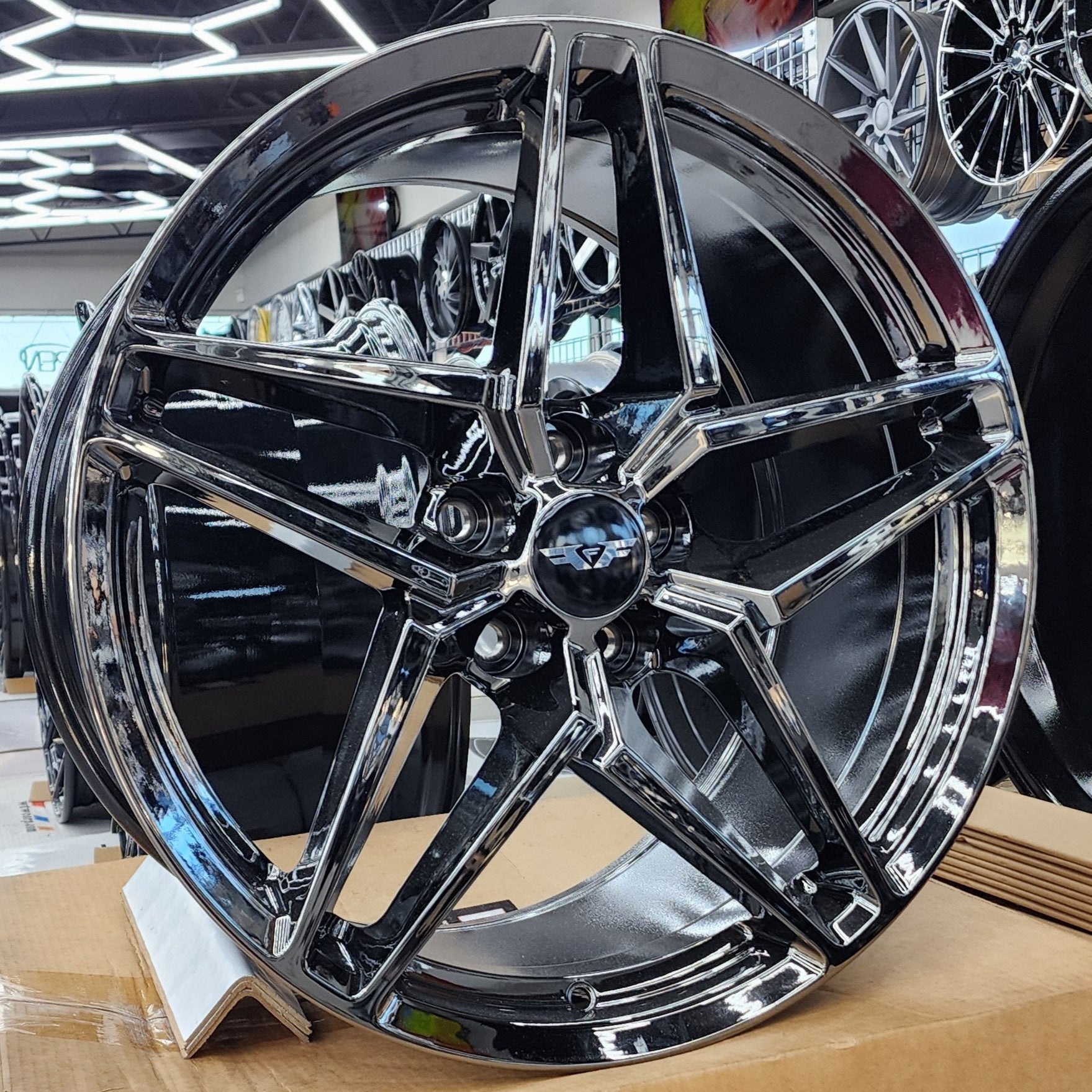 A single green leaf against a white background.