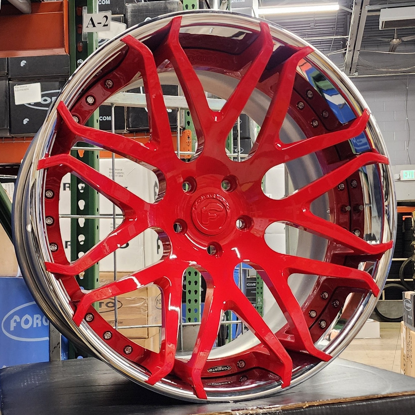 A single green leaf against a white background.