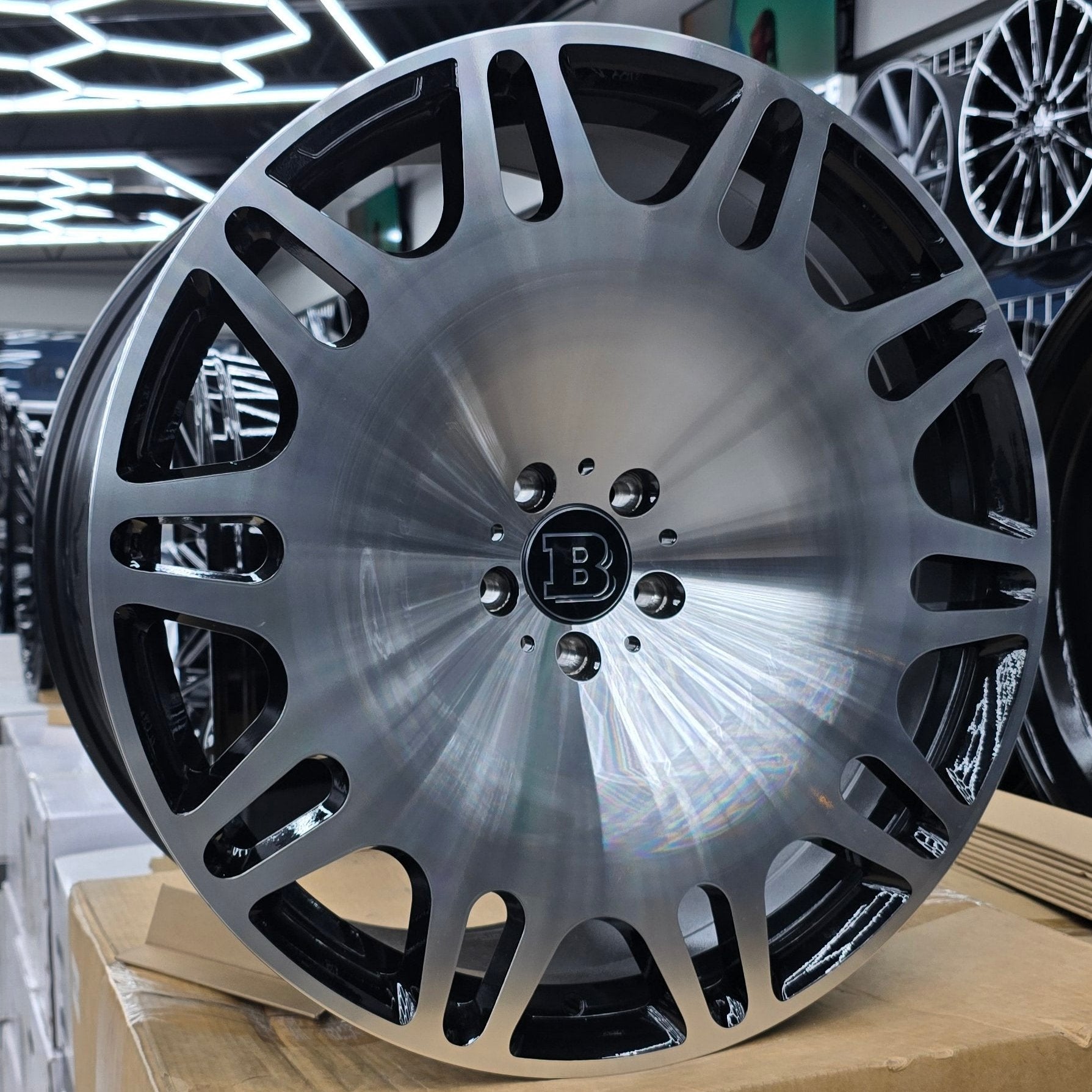 A single green leaf against a white background.