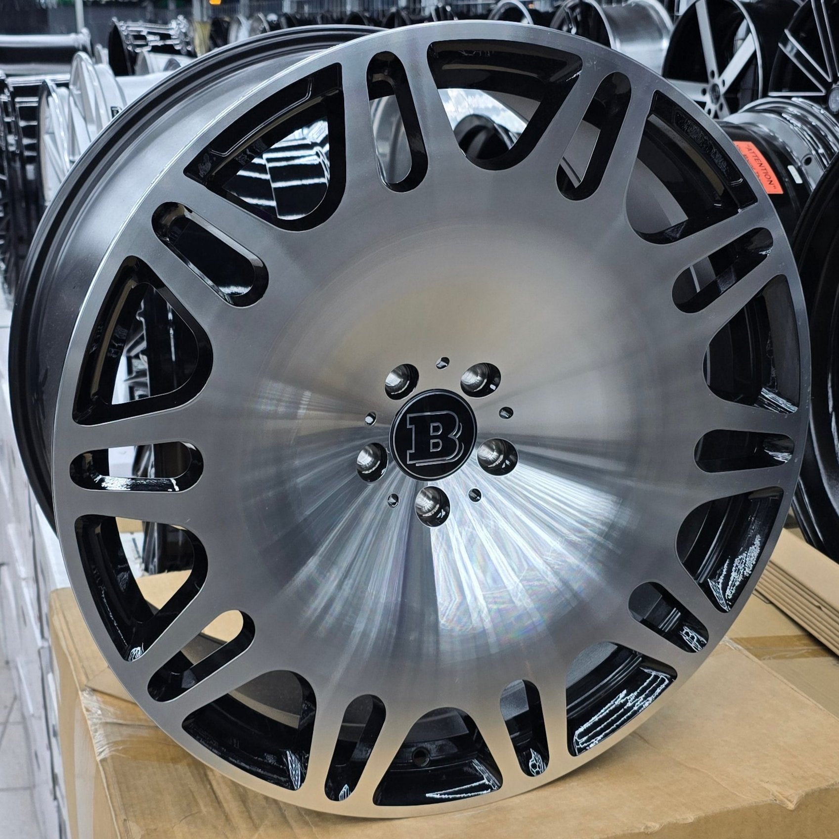 A single green leaf against a white background.