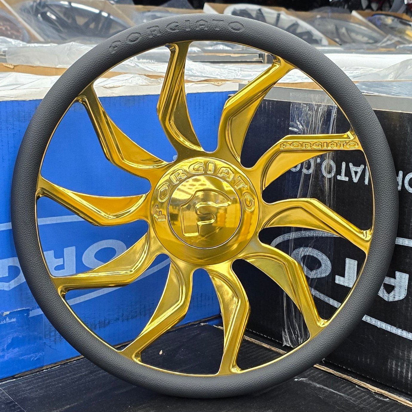 A single green leaf against a white background.