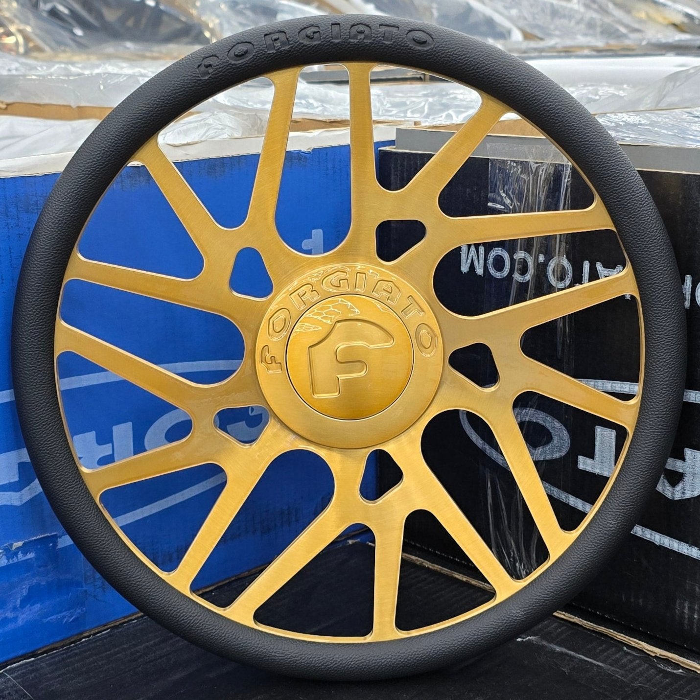 A single green leaf against a white background.