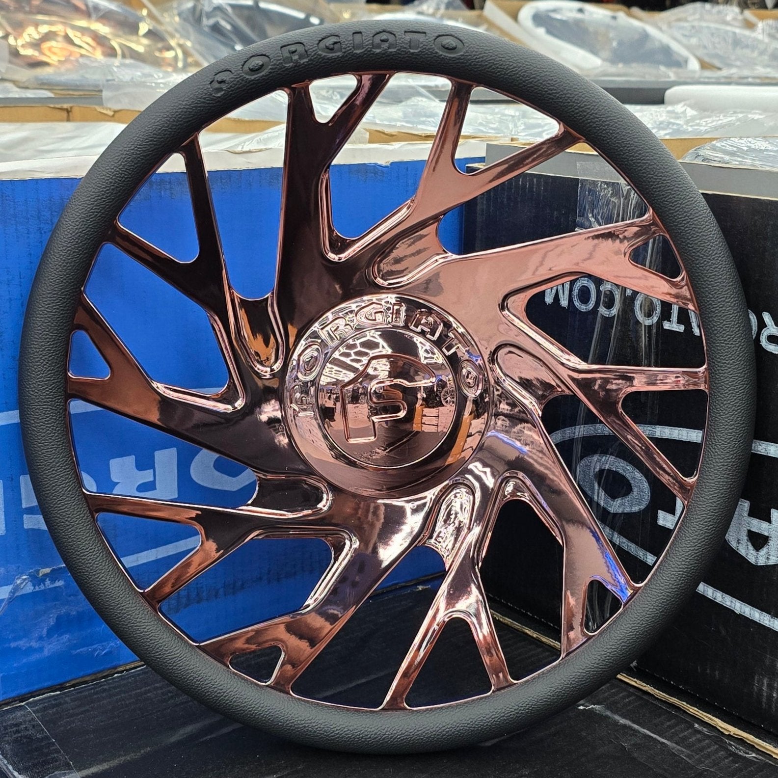A single green leaf against a white background.