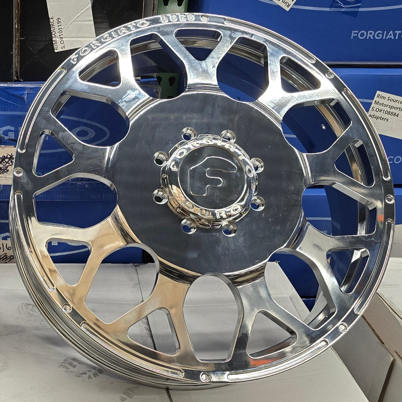 A single green leaf against a white background.