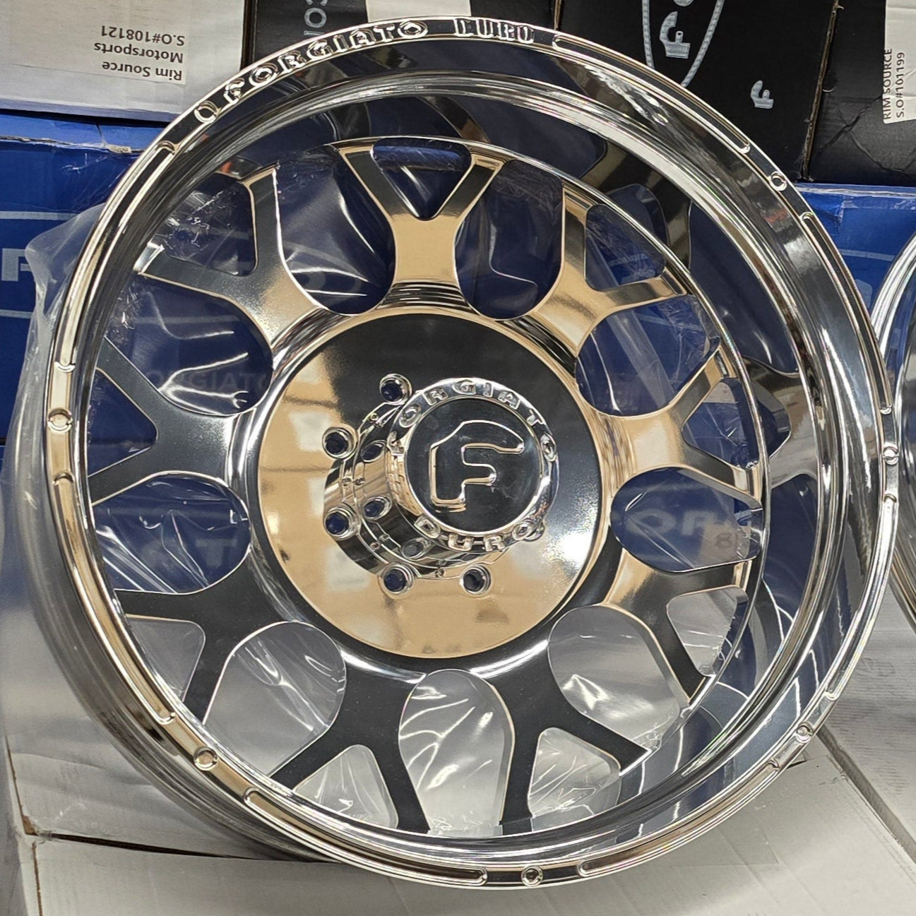 A single green leaf against a white background.