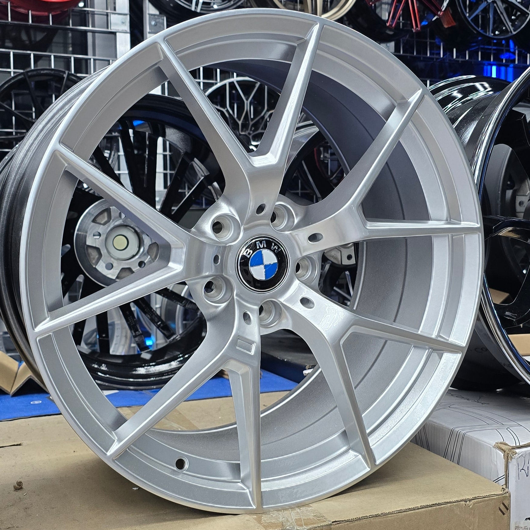 A single green leaf against a white background.