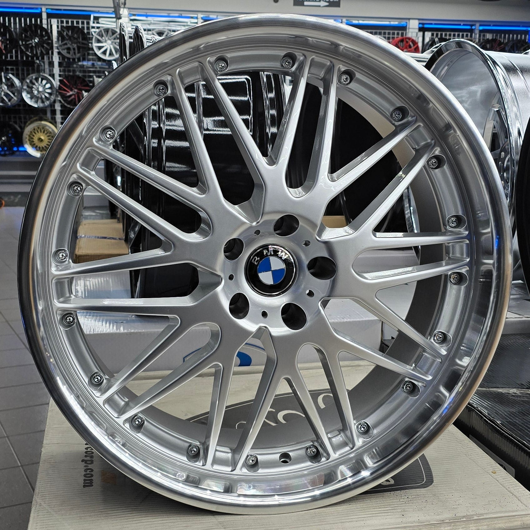 A single green leaf against a white background.