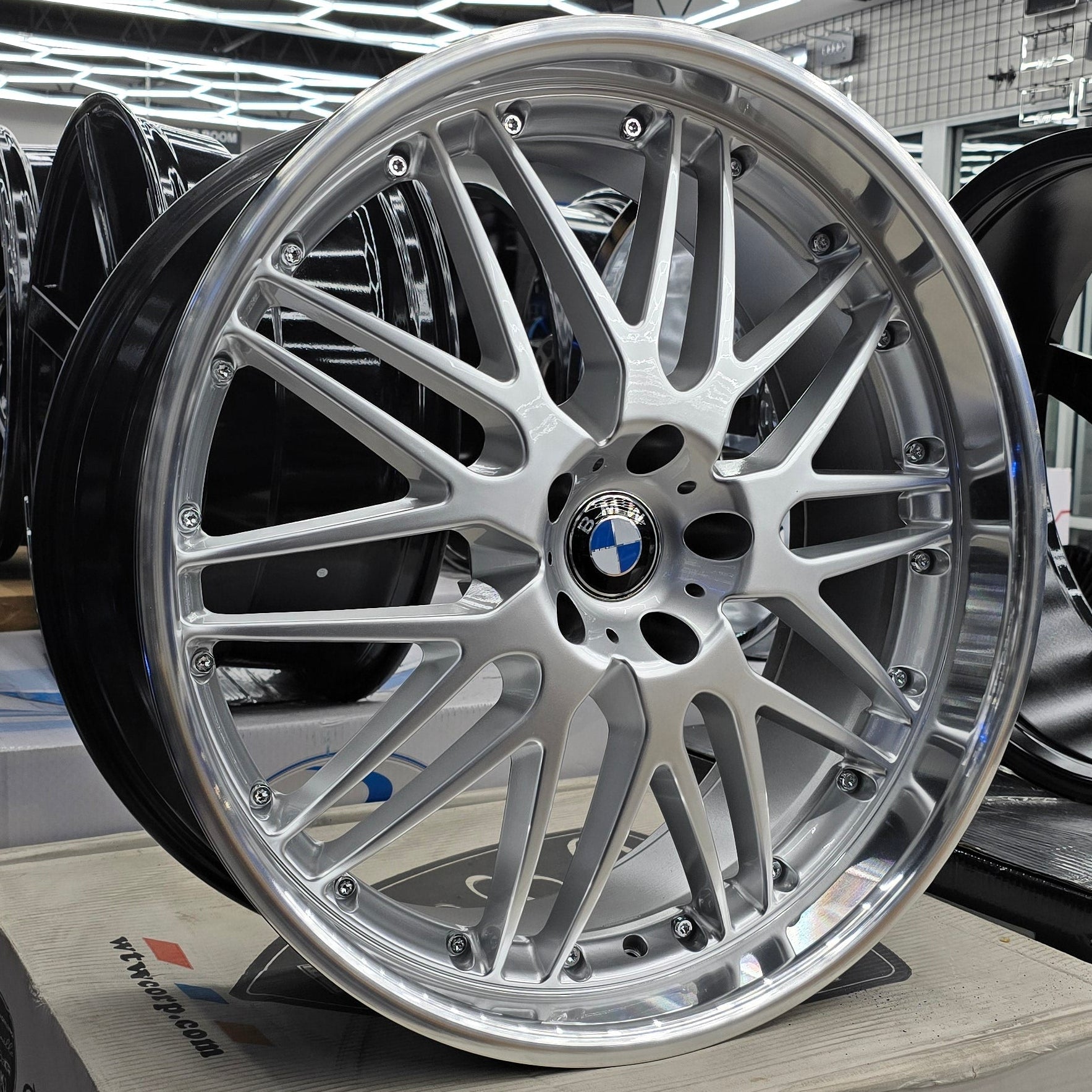 A single green leaf against a white background.