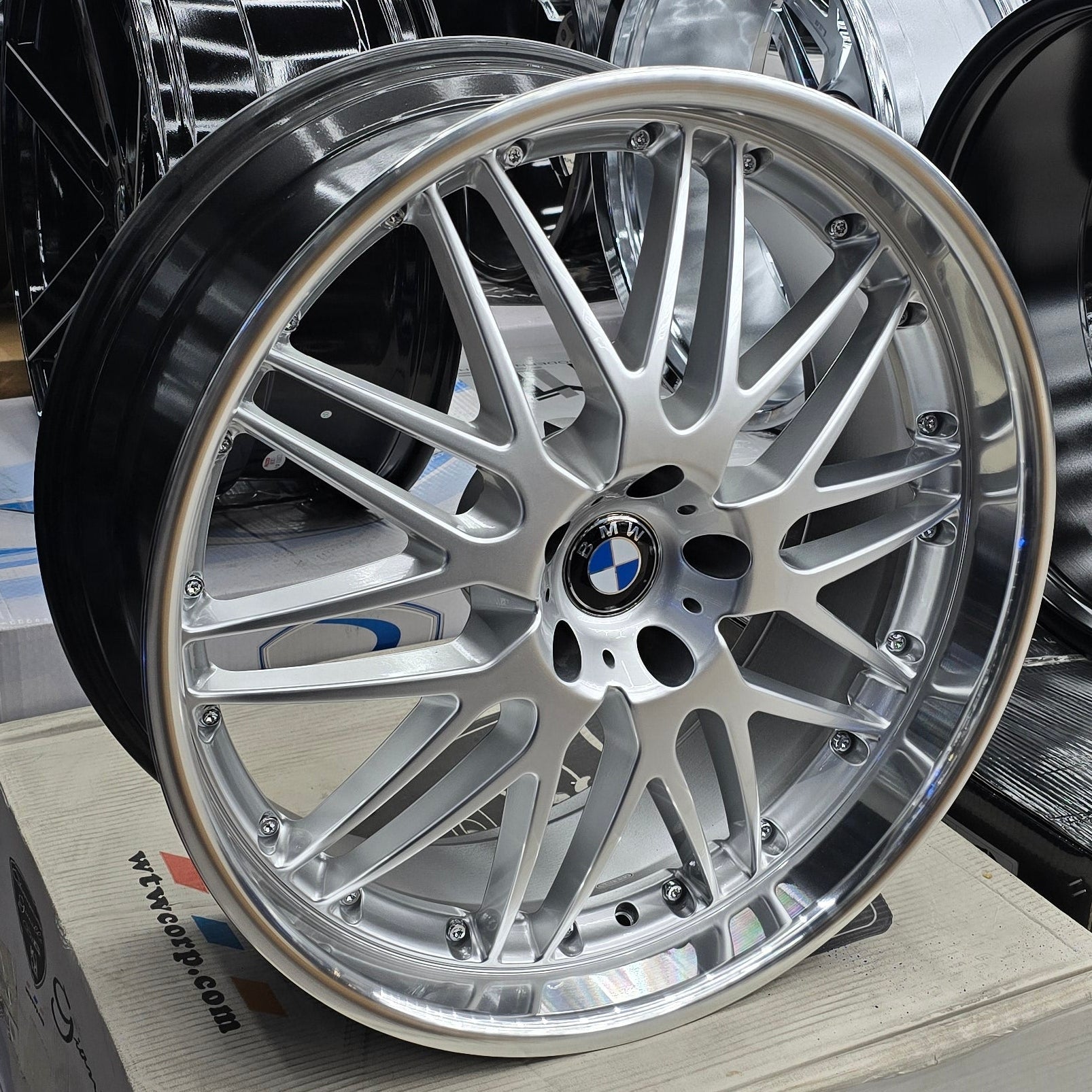 A single green leaf against a white background.