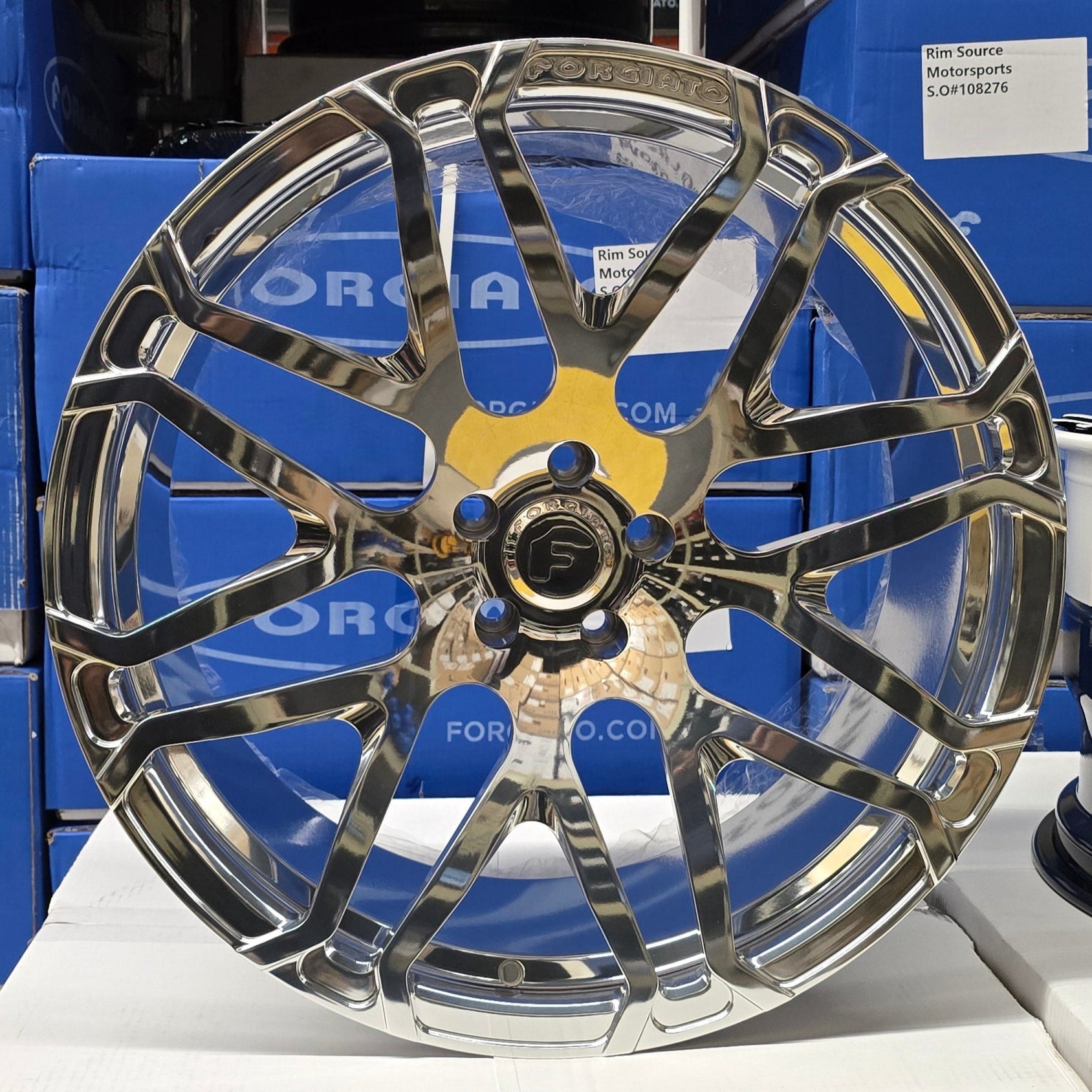 A single green leaf against a white background.