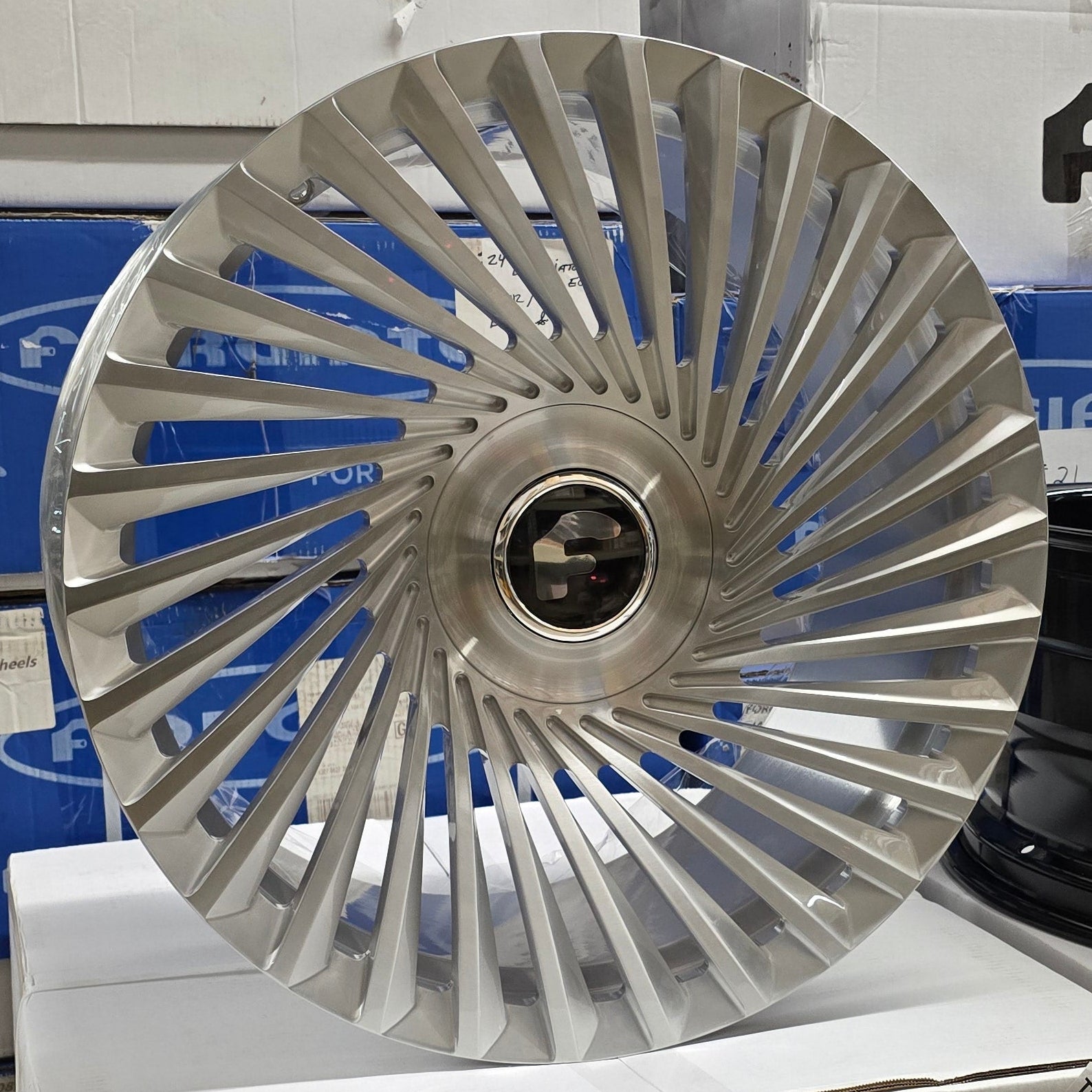 A single green leaf against a white background.