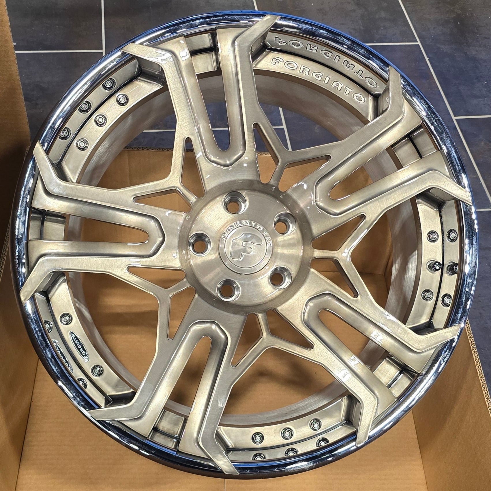 A single green leaf against a white background.