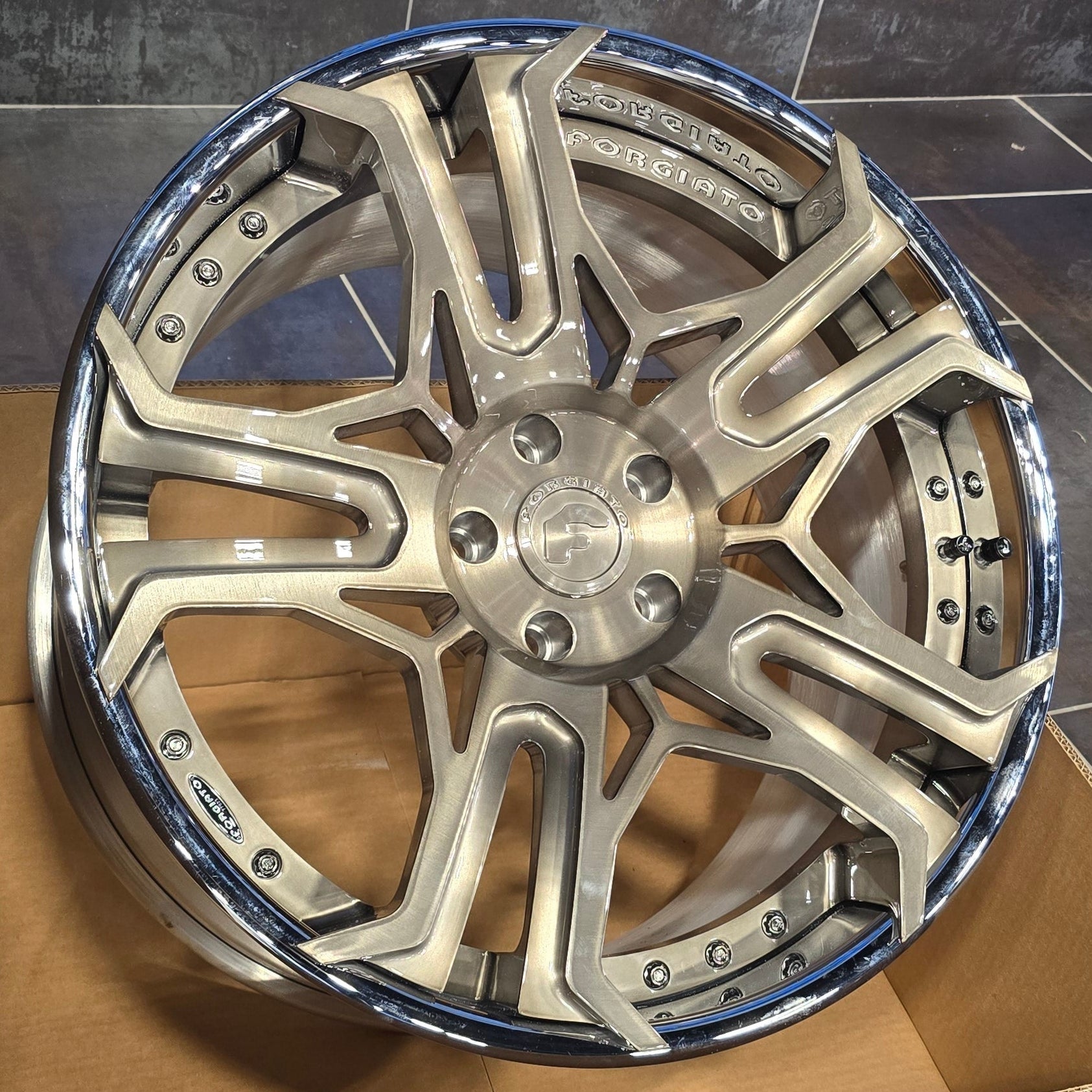 A single green leaf against a white background.