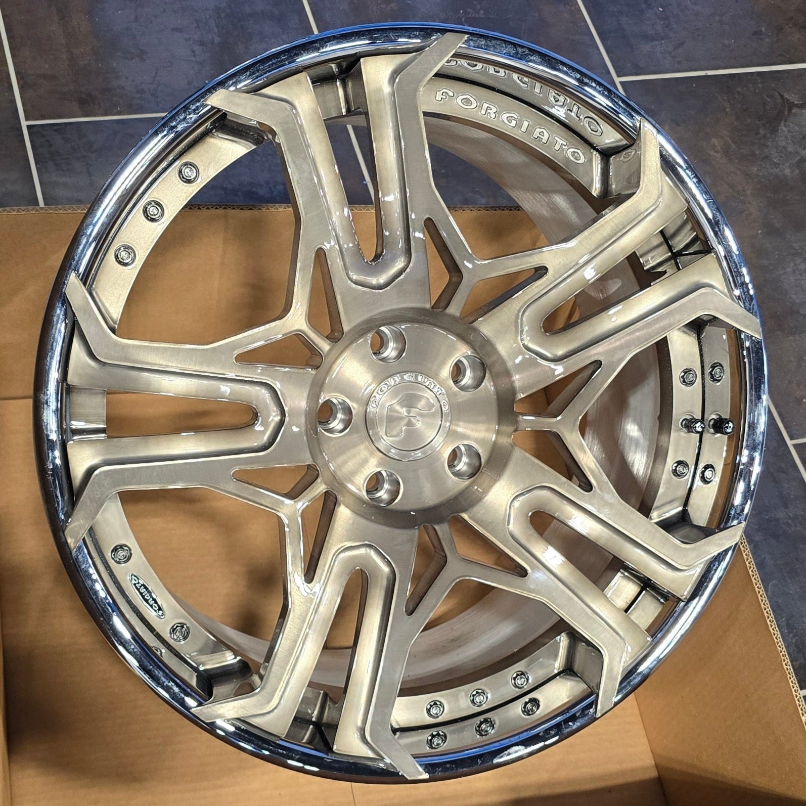 A single green leaf against a white background.