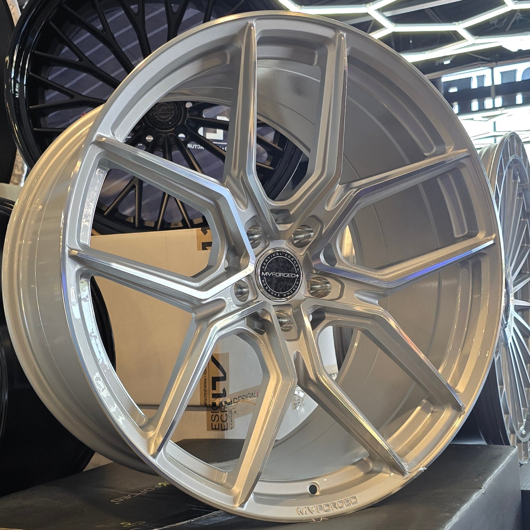 A single green leaf against a white background.