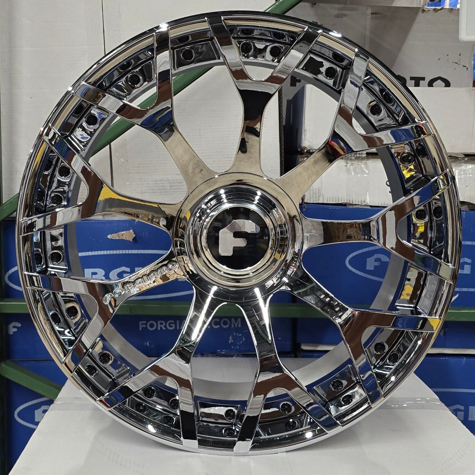 A single green leaf against a white background.