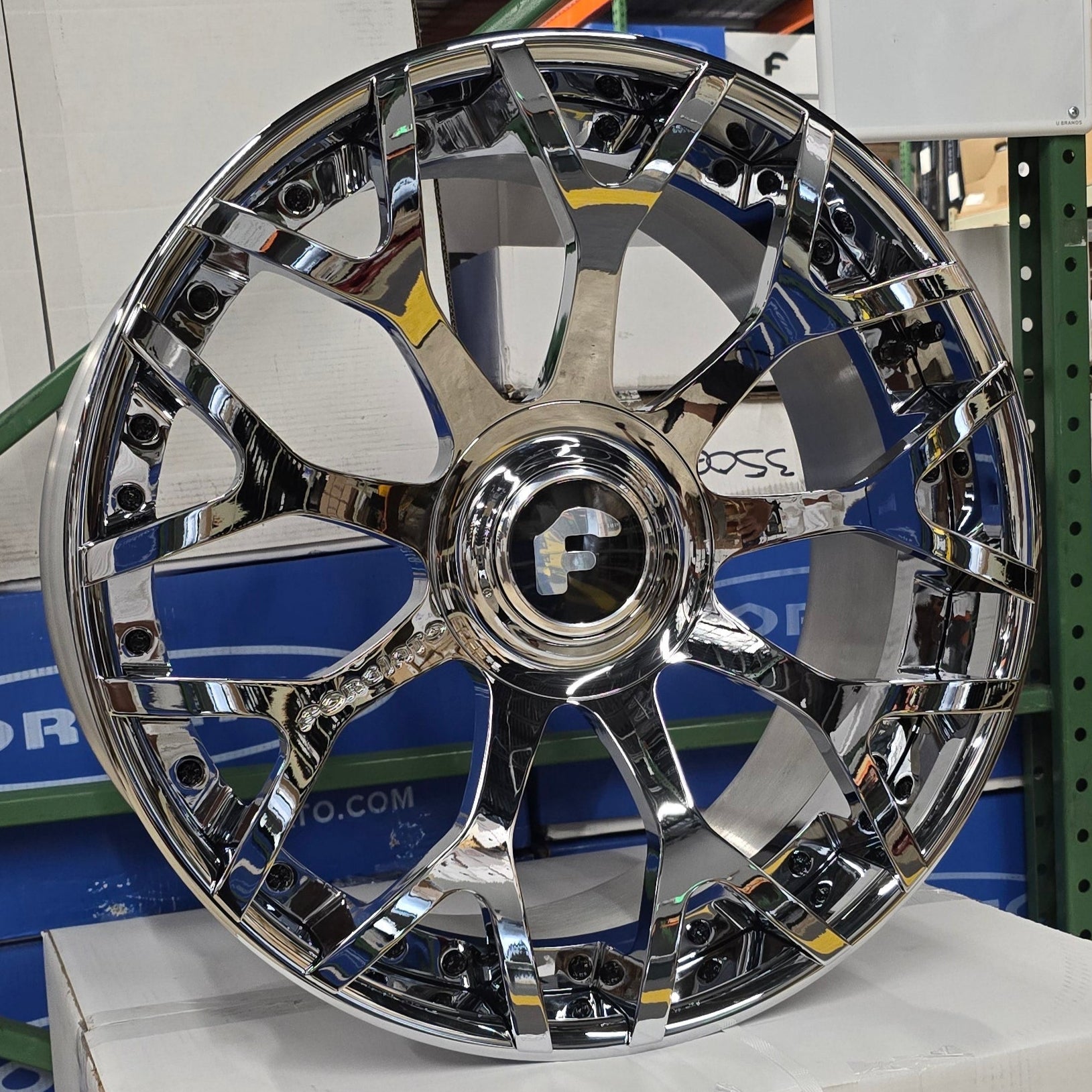 A single green leaf against a white background.