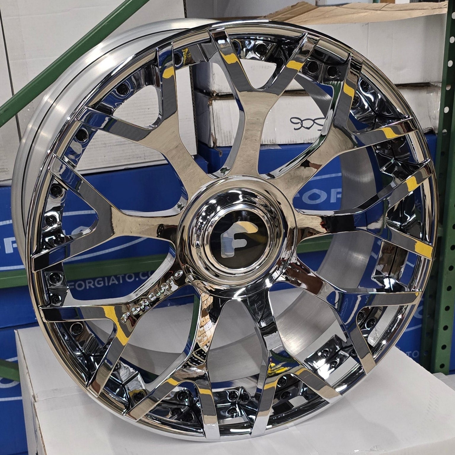 A single green leaf against a white background.