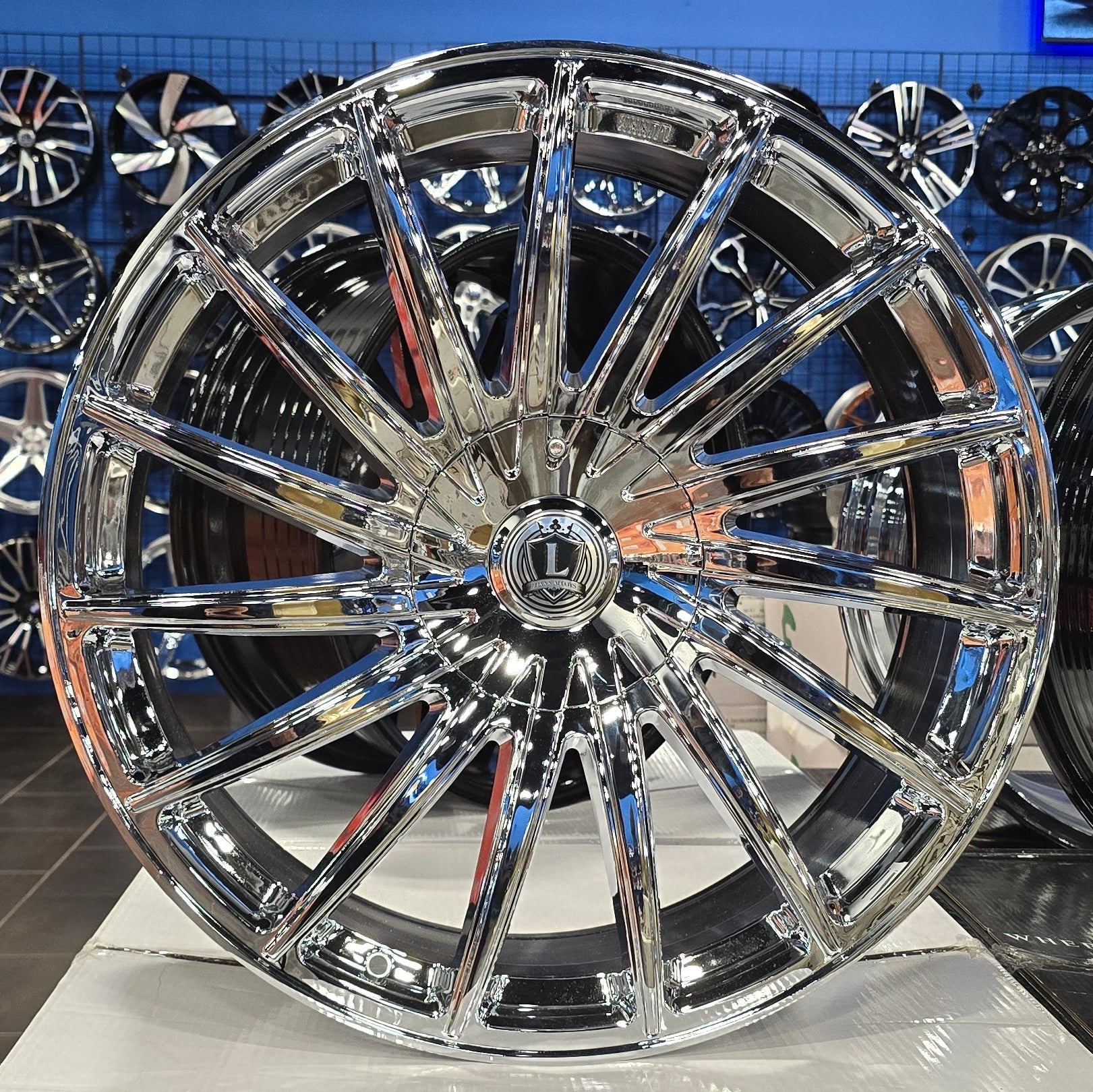 A single green leaf against a white background.