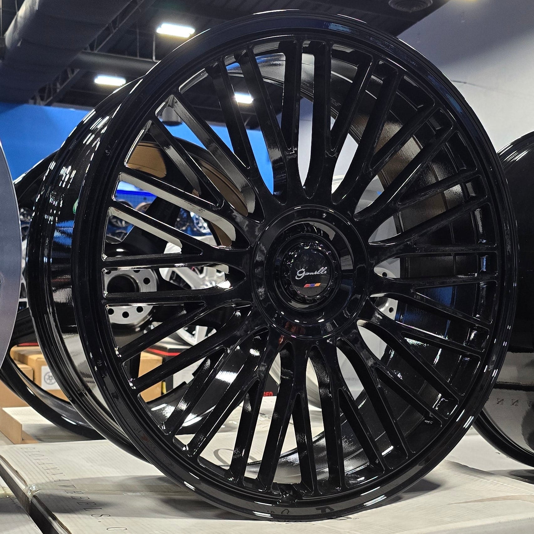 A single green leaf against a white background.