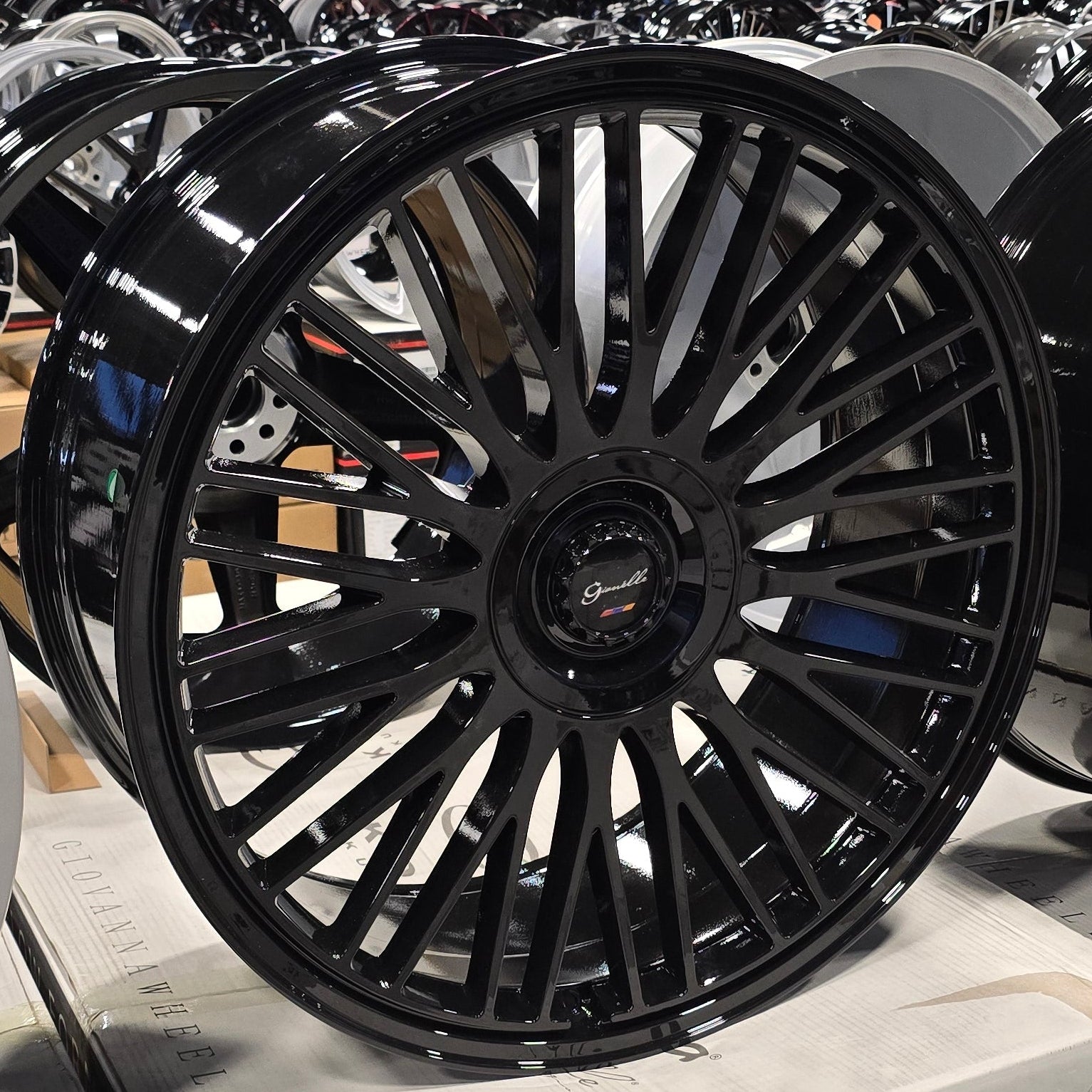 A single green leaf against a white background.