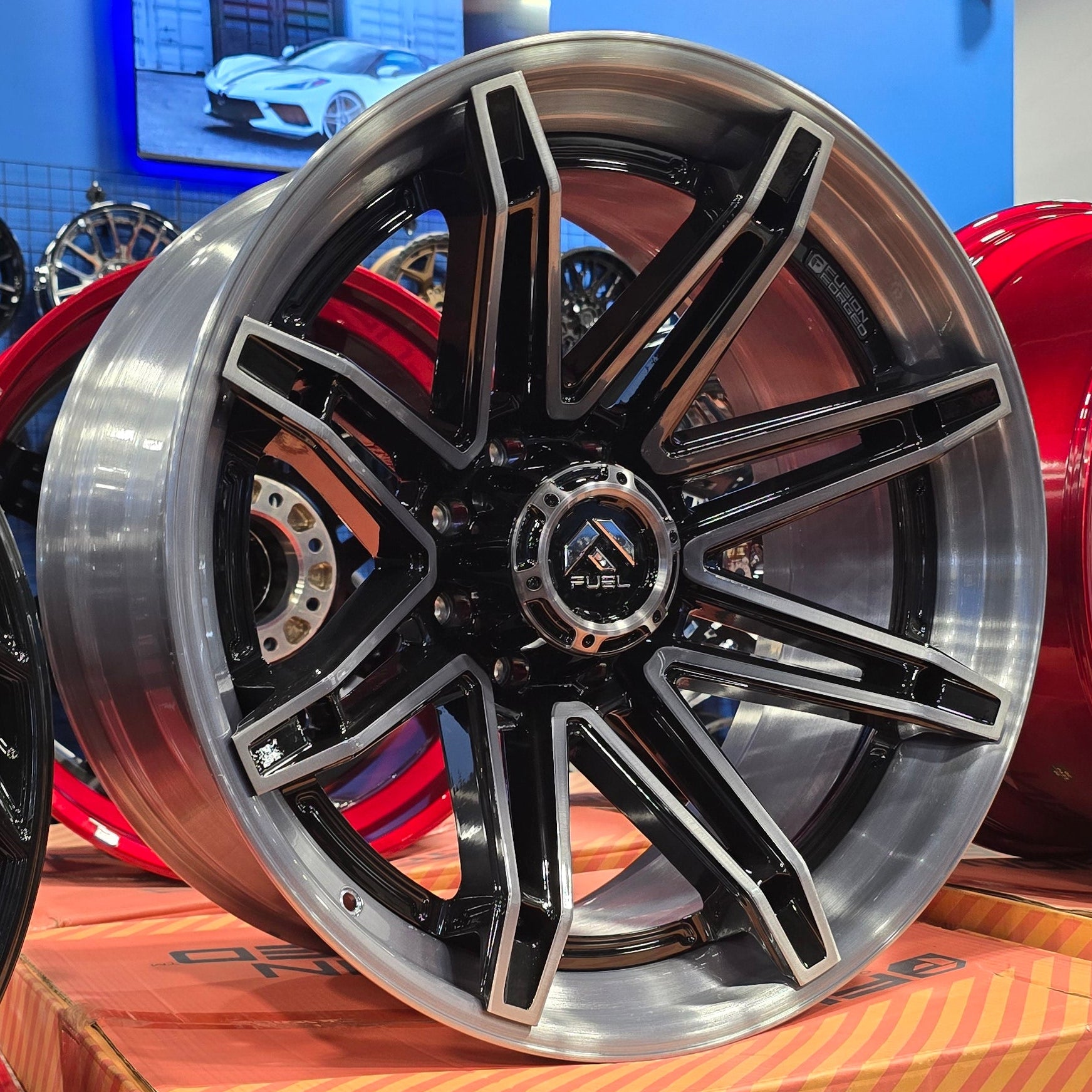 A single green leaf against a white background.