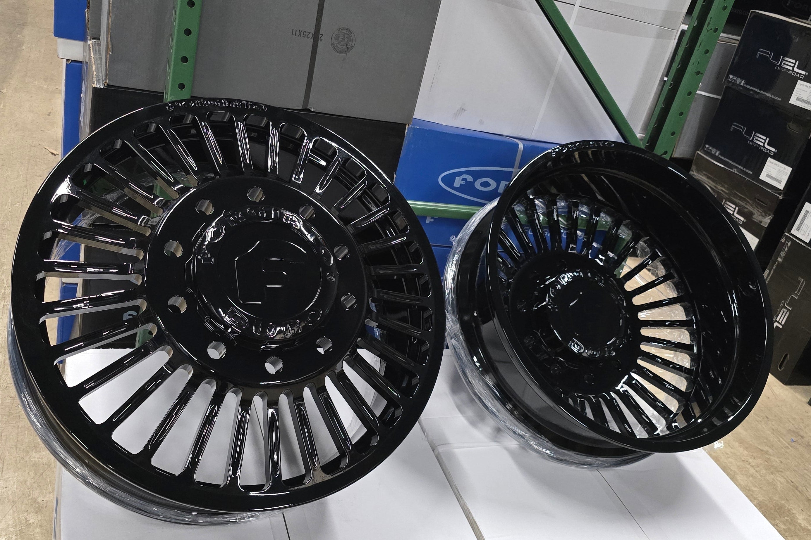 A single green leaf against a white background.